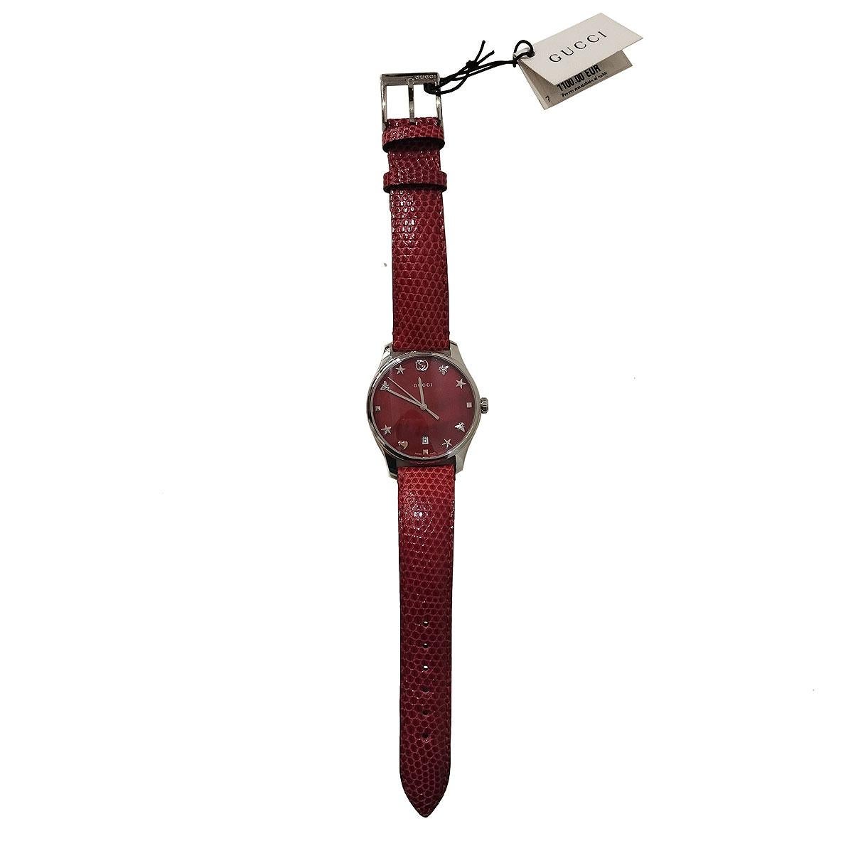 Beautiful and brand new Gucci watch
Timeless Watch
YA1264041
Steel 
Cherry red dial
Glass
Quartz mechanism (brand new battery)
Water resistant
Case 36 mm
Red lizard printed leather bracelet 
With box
Original price € 1100
Worldwide express shipping