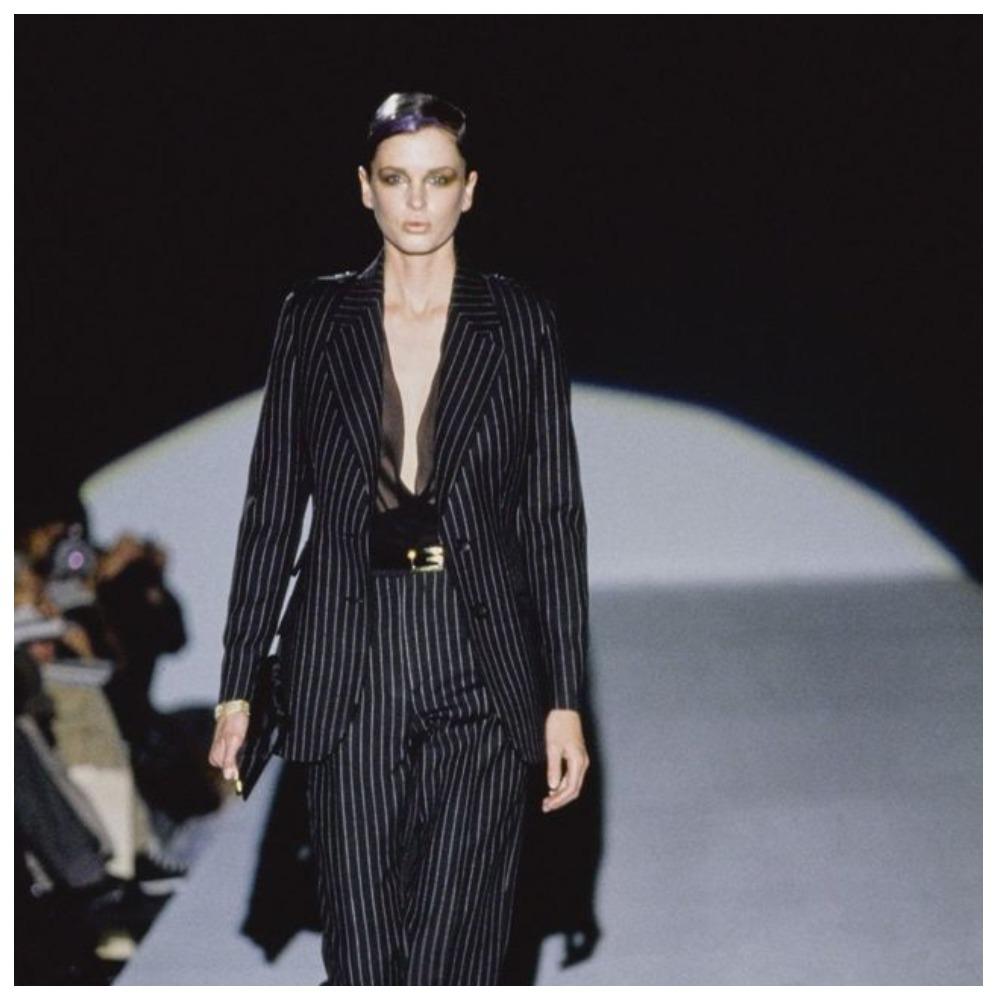 Gucci & Tom Ford 1996 fall / autumn blazer jacket.
A rare, iconic Gucci jacket from the Tom Ford era. 
It is made in an elegant and sexy Tom Ford style. 
Modeled by Kylie Box.
Georgina Grenville also wore this set in the July 1996 issue of Vogue,