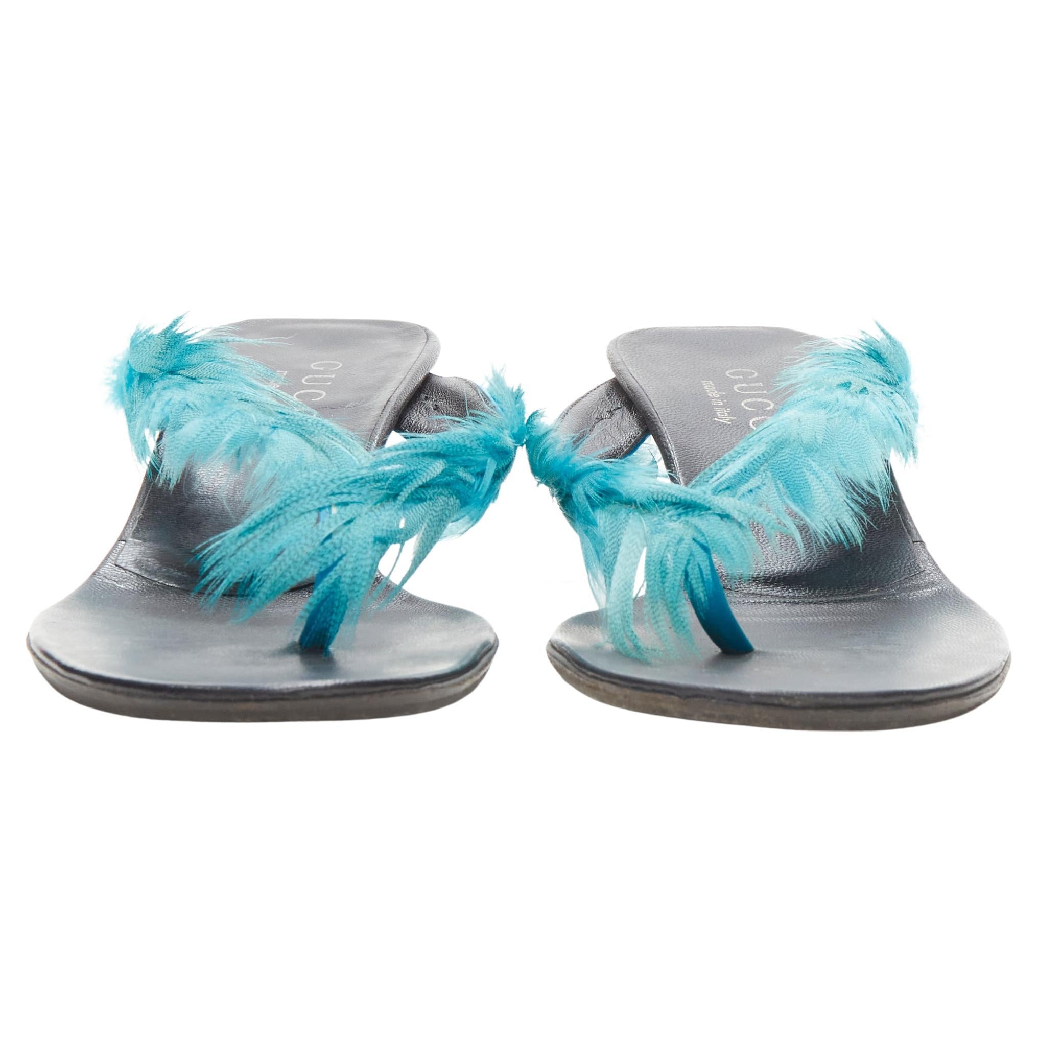 GUCCI TOM FORD 1999 Vintage blue feather thong high heel sandal EU35.5
Brand: Gucci
Designer: Tom Ford
Collection: 1999 Runway
Material: Feather
Color: Blue
Pattern: Solid
Extra Detail: Thong mid heel slipper. Comma heel.
Made in: