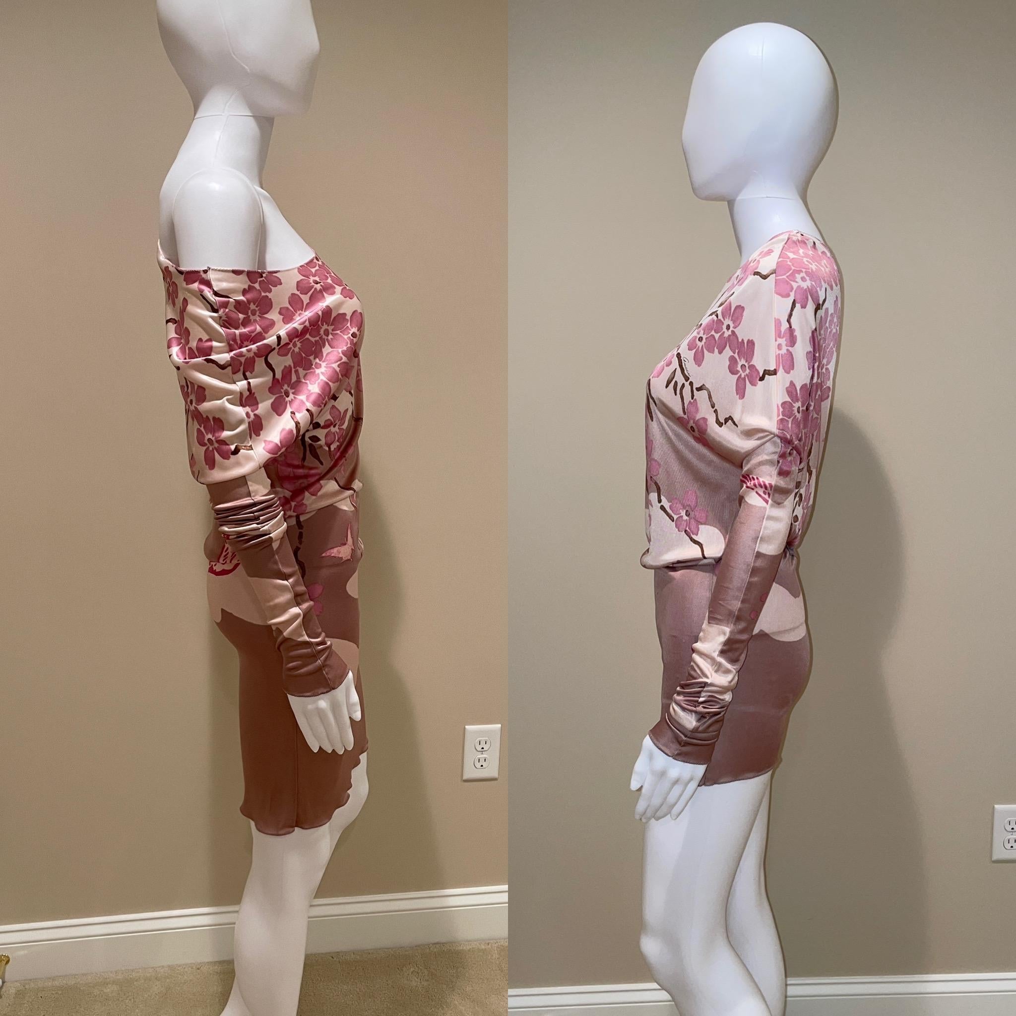 FINAL SALE. NO RETURNS, REFUNDS, NOR EXCHANGES.

Vintage SS03 Tom Ford for Gucci long sleeve cherry blossom mini dress. This dress could also be worn as a blouse if you wish. You can wear it off either shoulder and scrunch up the bottom as short as