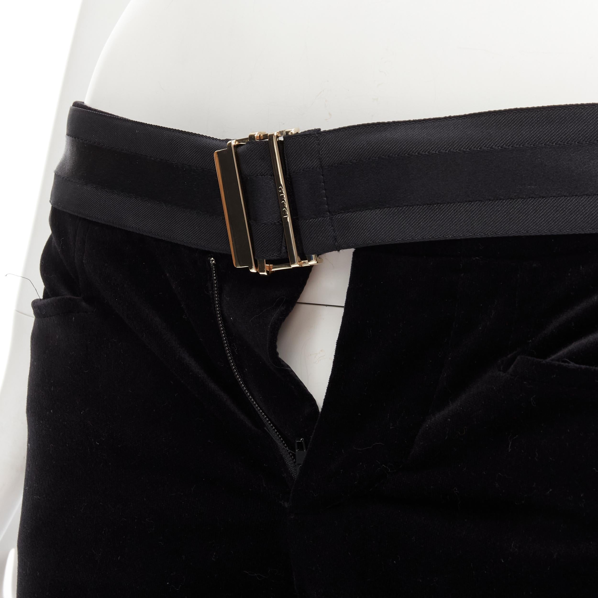 GUCCI TOM FORD 2004 Vintage black web gold buckle velvet flared pants IT38 XS 
Reference: ANWU/A00431 
Brand: Gucci 
Designer: Tom Ford 
Material: Velvet 
Color: Black 
Pattern: Solid 
Closure: Zip 
Extra Detail: Tonal black web attached belt with