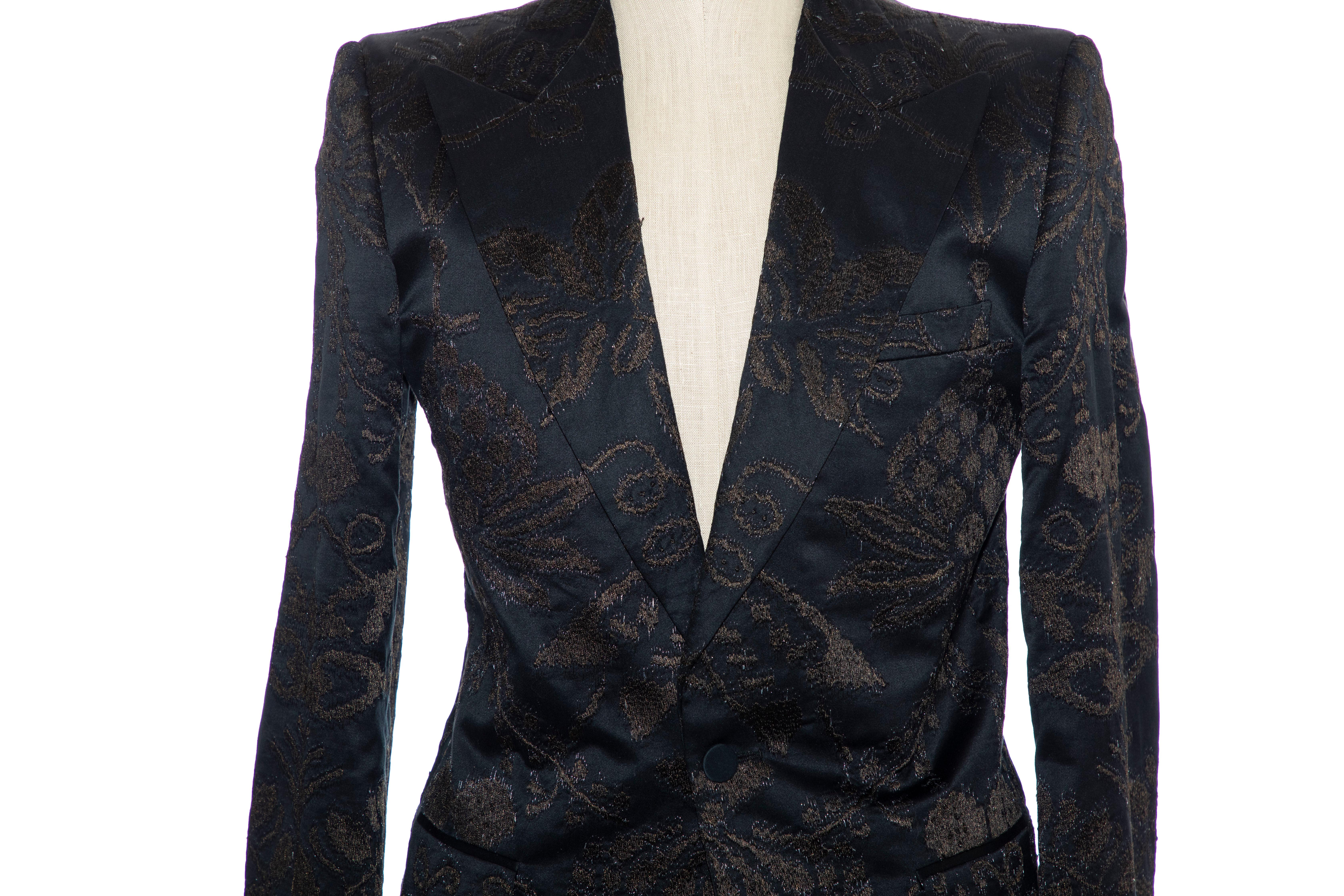 Tom Ford for Gucci black jacquard satin tuxedo blazer with peaked lapels, structured shoulders, three exterior pockets, embroidered jacquard pattern throughout, dual vents at rear, long sleeves, tonal satin lining, four interior pockets and
