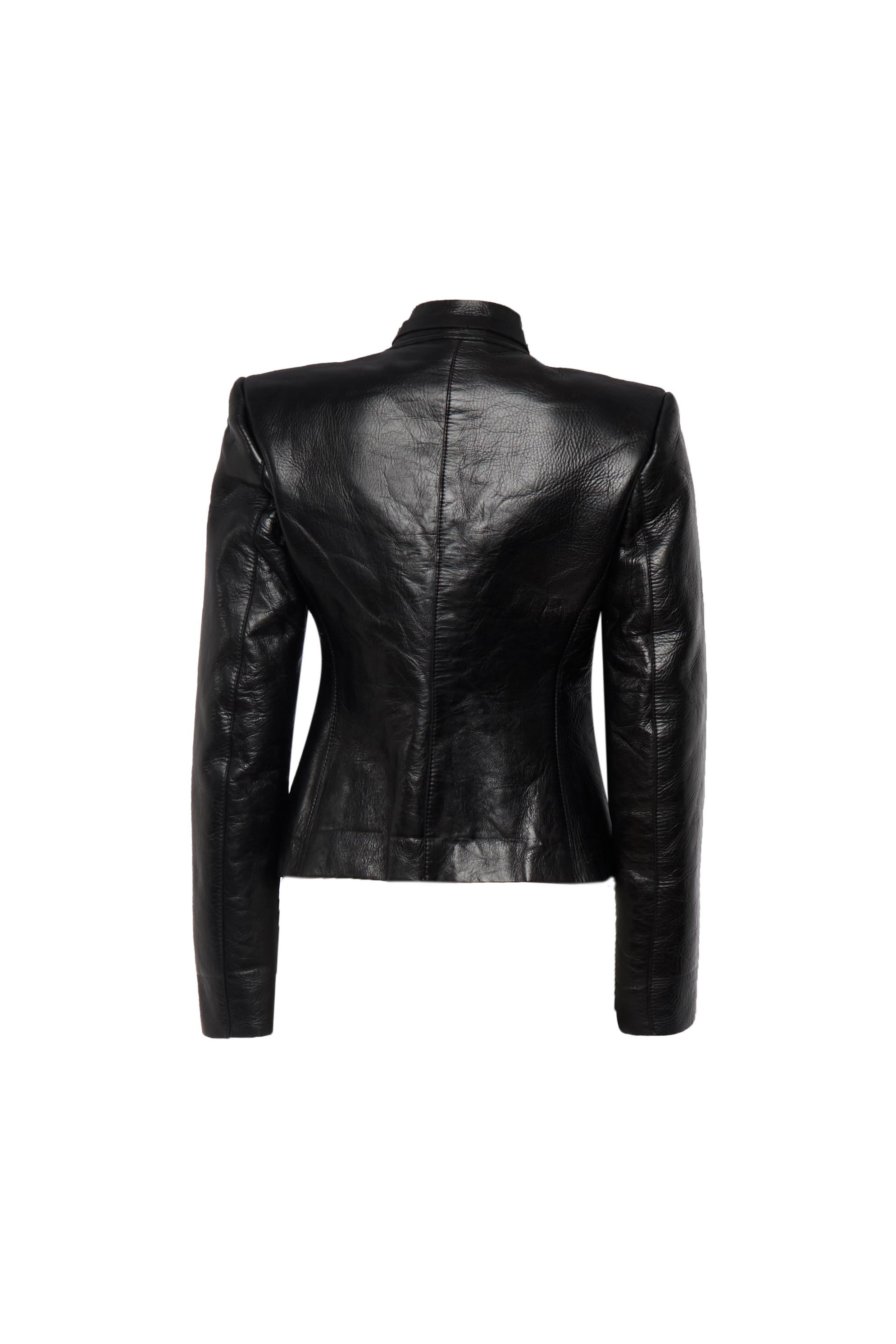 A stunning piece from the Tom Ford era at Gucci, this black leather jacket is the perfect blend of elegance and boldness. Crafted from premium  leather, it features a sharp, structured silhouette with a high collar and a sleek front zipper, making