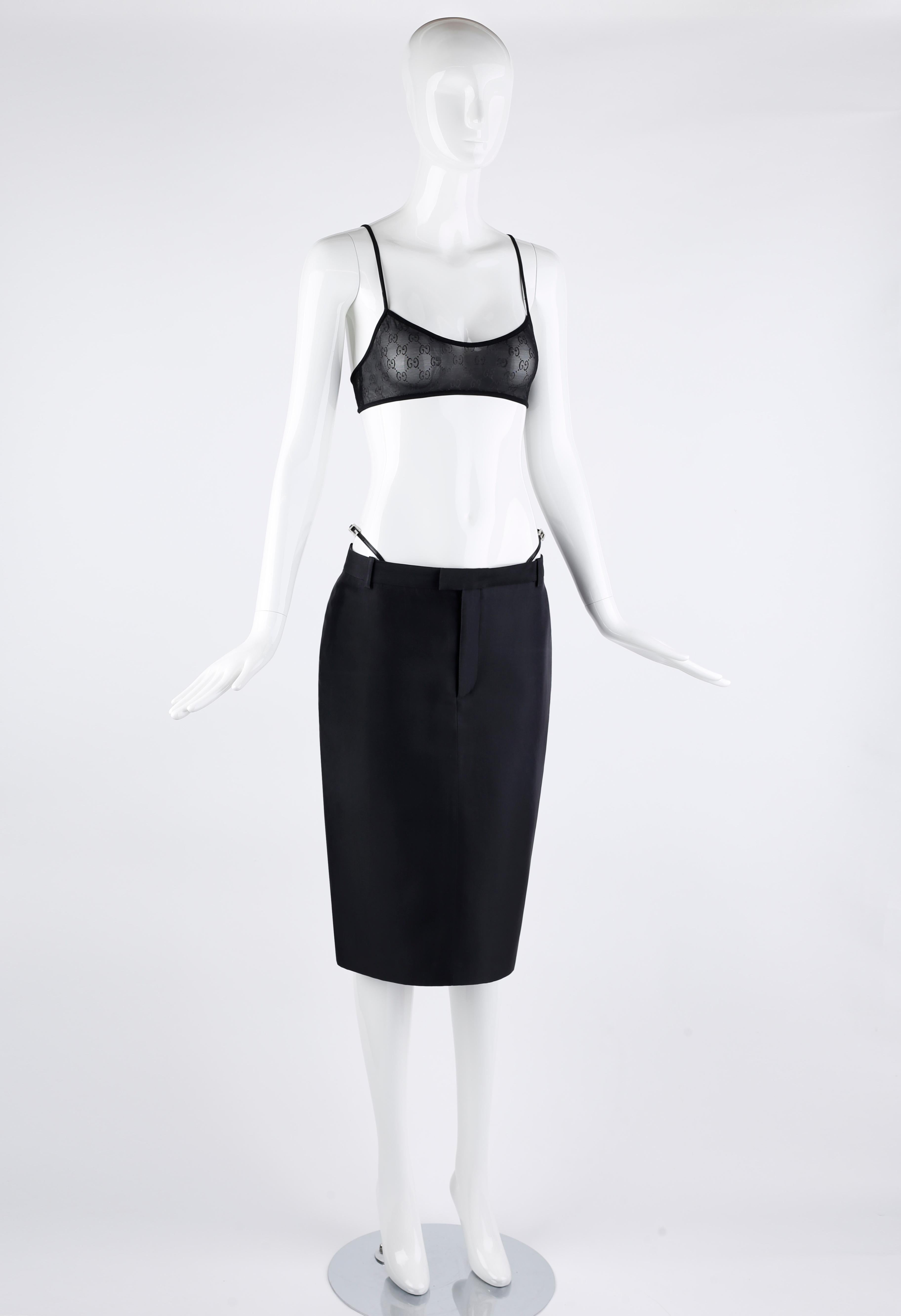 Gucci by Tom Ford for the Spring/Summer 1998 collection; both items were worn on the runway for that season. Skirt features a leather strap at each hip with a 