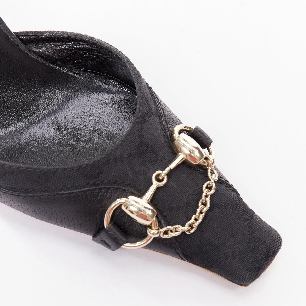 GUCCI Tom Ford Vintage black canvas monogram GG gold horsebit mule pumps EU37
Reference: TGAS/F00160
Brand: Gucci
Designer: Tom Ford
Material: Canvas, Leather
Color: Black, Gold
Pattern: Monogram
Closure: Slip On
Lining: Black Leather
Extra Details: