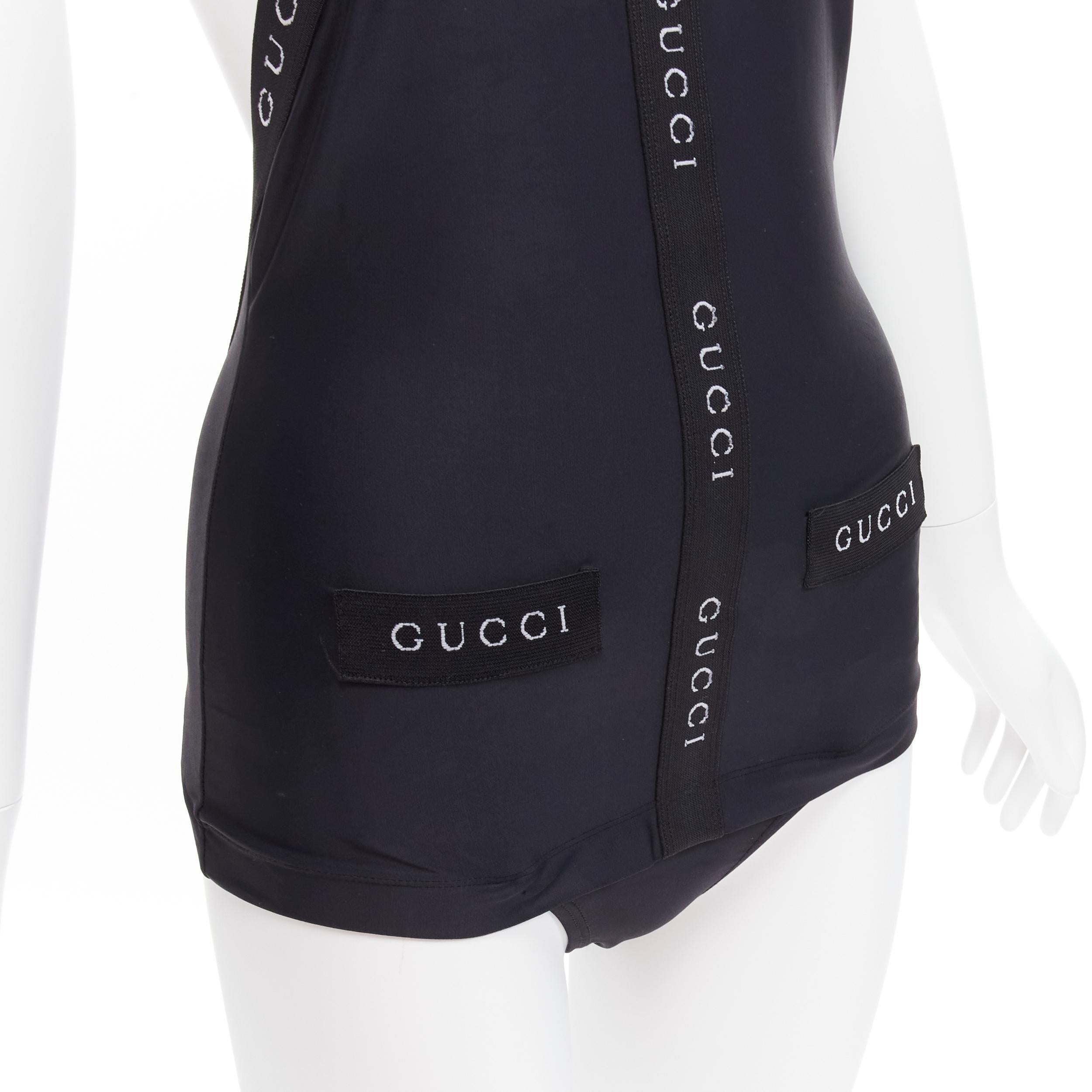 GUCCI Tom Ford Vintage black logo trim halter layered one piece swimwear XS
Reference: TGAS/D00173
Brand: Gucci
Designer: Tom Ford
Material: Nylon
Color: Black, White
Pattern: Solid
Closure: Slip On
Lining: Black
Made in: