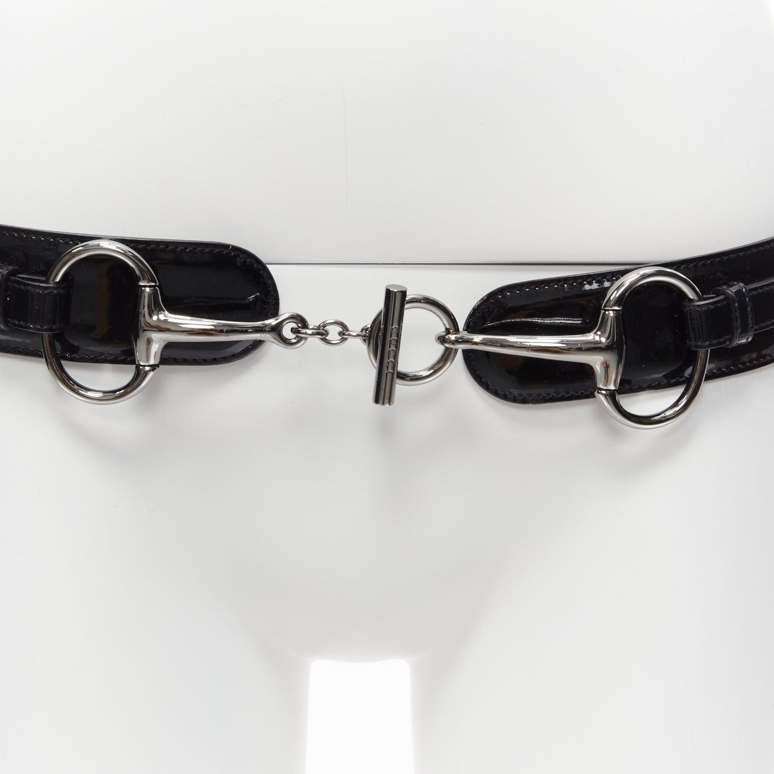 GUCCI Tom Ford Vintage black patent GG logo Horsebit buckle belt
Reference: GIYG/A00277
Brand: Gucci
Designer: Tom Ford
Material: Patent Leather, Metal
Color: Black, Silver
Pattern: Solid
Closure: Loop Through
Lining: Black Leather
Made in: