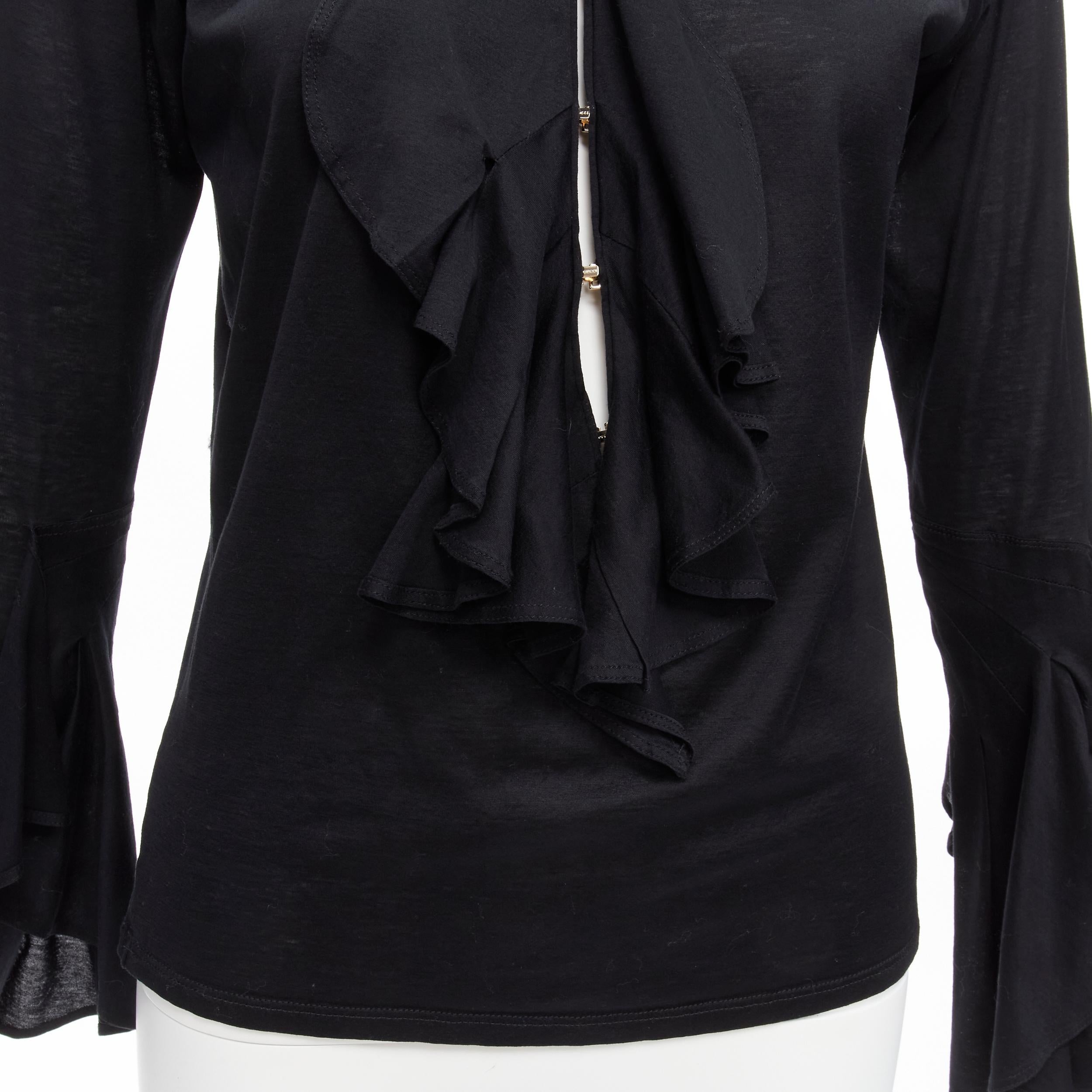 GUCCI Tom Ford Vintage black ruffle front velvet trim GG logo bell sleeves top S
Reference: TGAS/D00328
Brand: Gucci
Designer: Tom Ford
Material: Cotton
Color: Black
Pattern: Solid
Closure: Hook & Eye
Extra Details: GUCCI logo hook and eye front