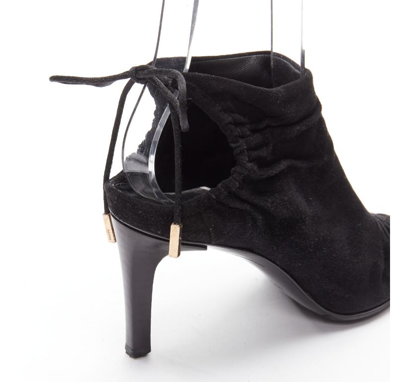 GUCCI Tom Ford Vintage black suede leather ruched toe tie back bootie EU36C
Reference: ANWU/A01051
Brand: Gucci
Designer: Tom Ford
Material: Suede
Color: Black
Pattern: Solid
Closure: Self Tie
Lining:  Leather
Extra Details: Leather tie back with