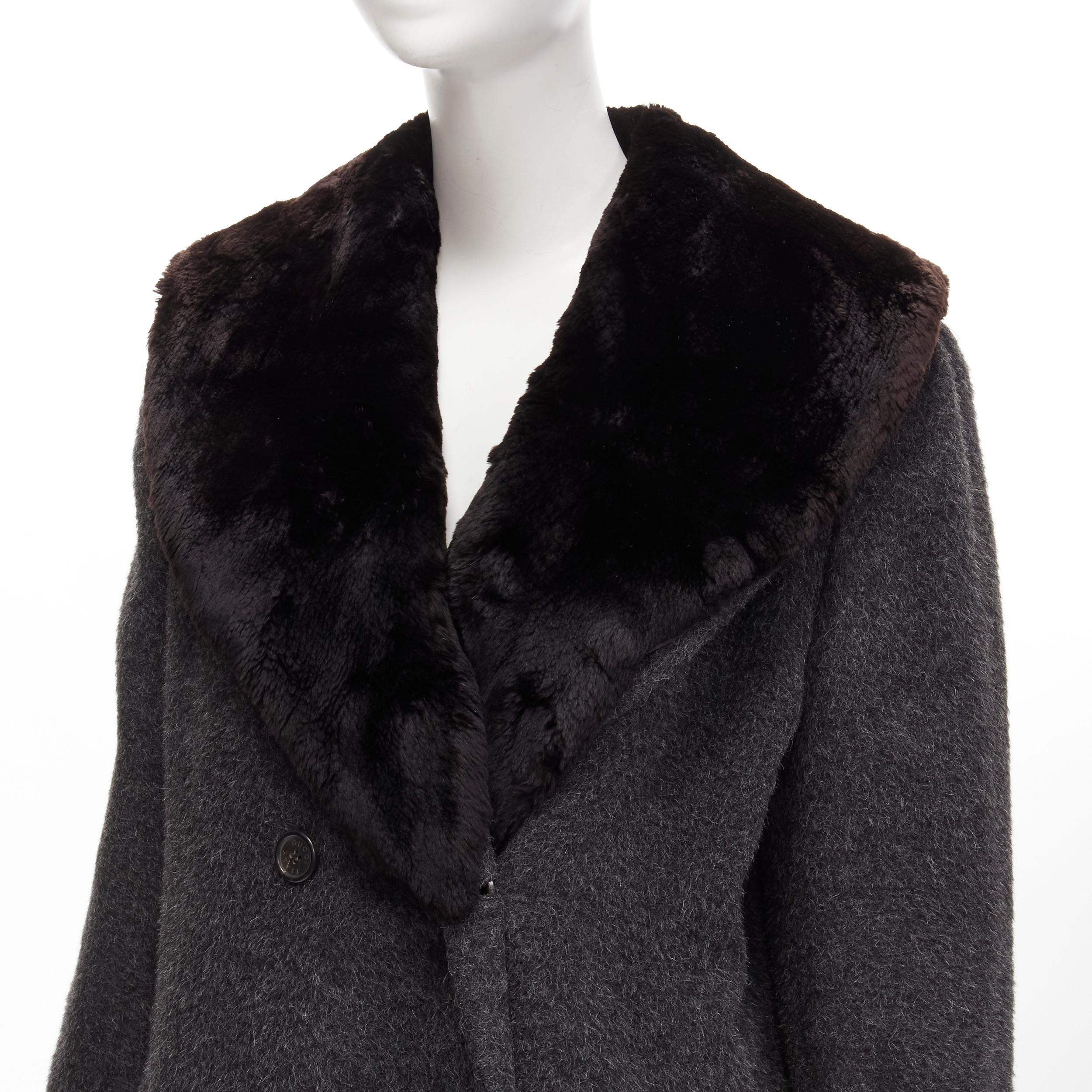 GUCCI Tom Ford Vintage grey alpaca fur collar double brested winter coat IT42 M
Reference: TGAS/C01629
Brand: Gucci
Designer: Tom Ford
Material: Alpaca, Blend
Color: Grey
Pattern: Solid
Closure: Button
Lining: Fabric
Extra Details: Belt loop for