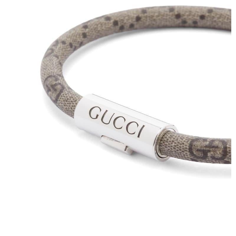 Complete your look with some Gucci luxury and this Leather Strap Bracelet. Expertly crafted using premium leather and engraved silver detailing, this unmistakable accessory ensures an effortlessly elegant look whatever the occasion.

Name -