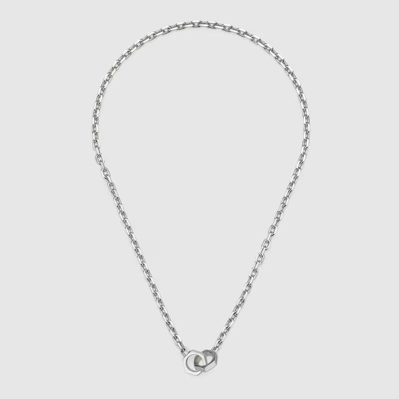 The Gucci Trademark line combines motifs and hexagonal bolt charms with the name of the House. From the cut-out heart to the padlock pendant, playful symbols continue to distinguish a selection of rings, necklaces, bracelets and earrings for