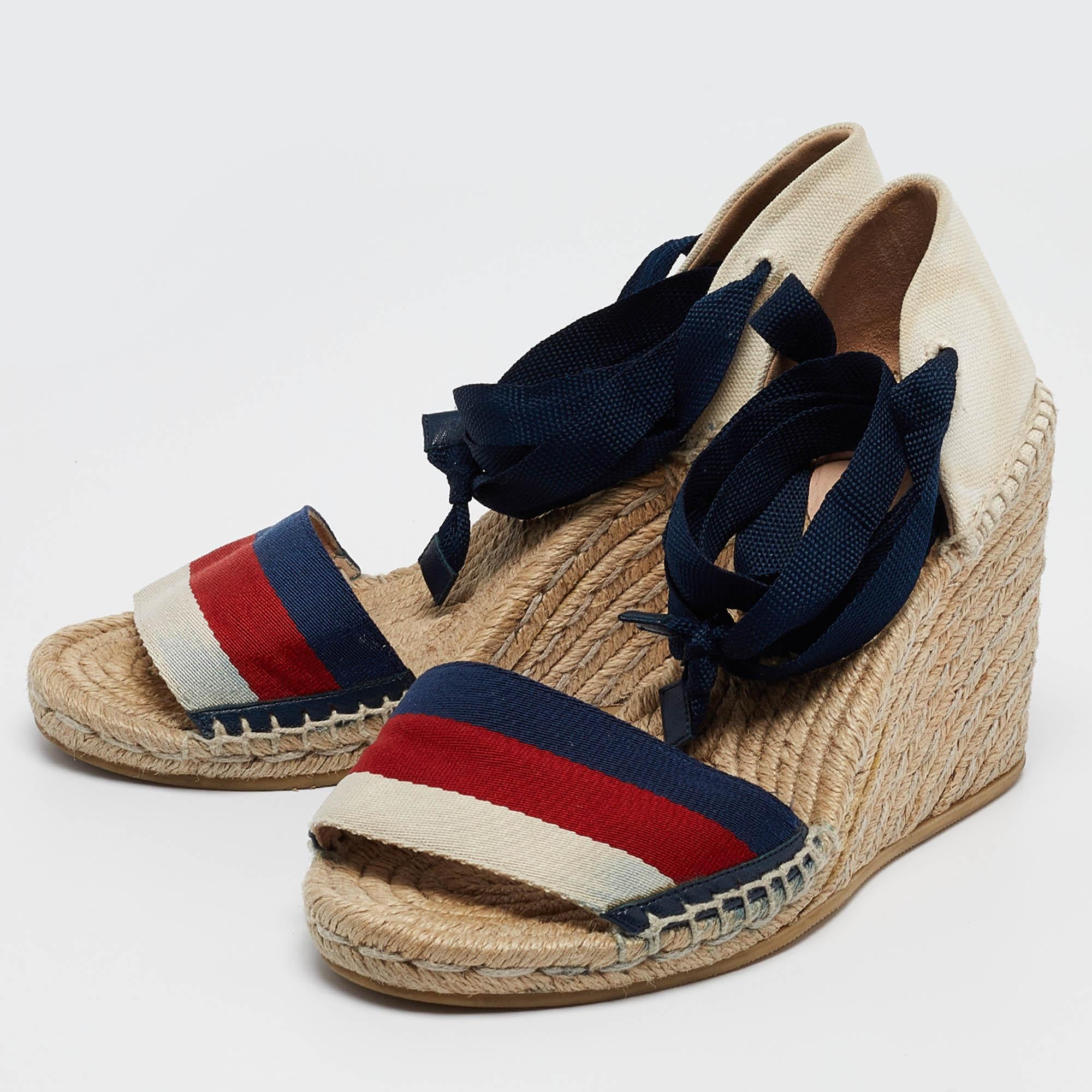 Make a statement with these Gucci wedge sandals for women. Impeccably crafted these chic heels offer both fashion and comfort elevating your look with each graceful step.