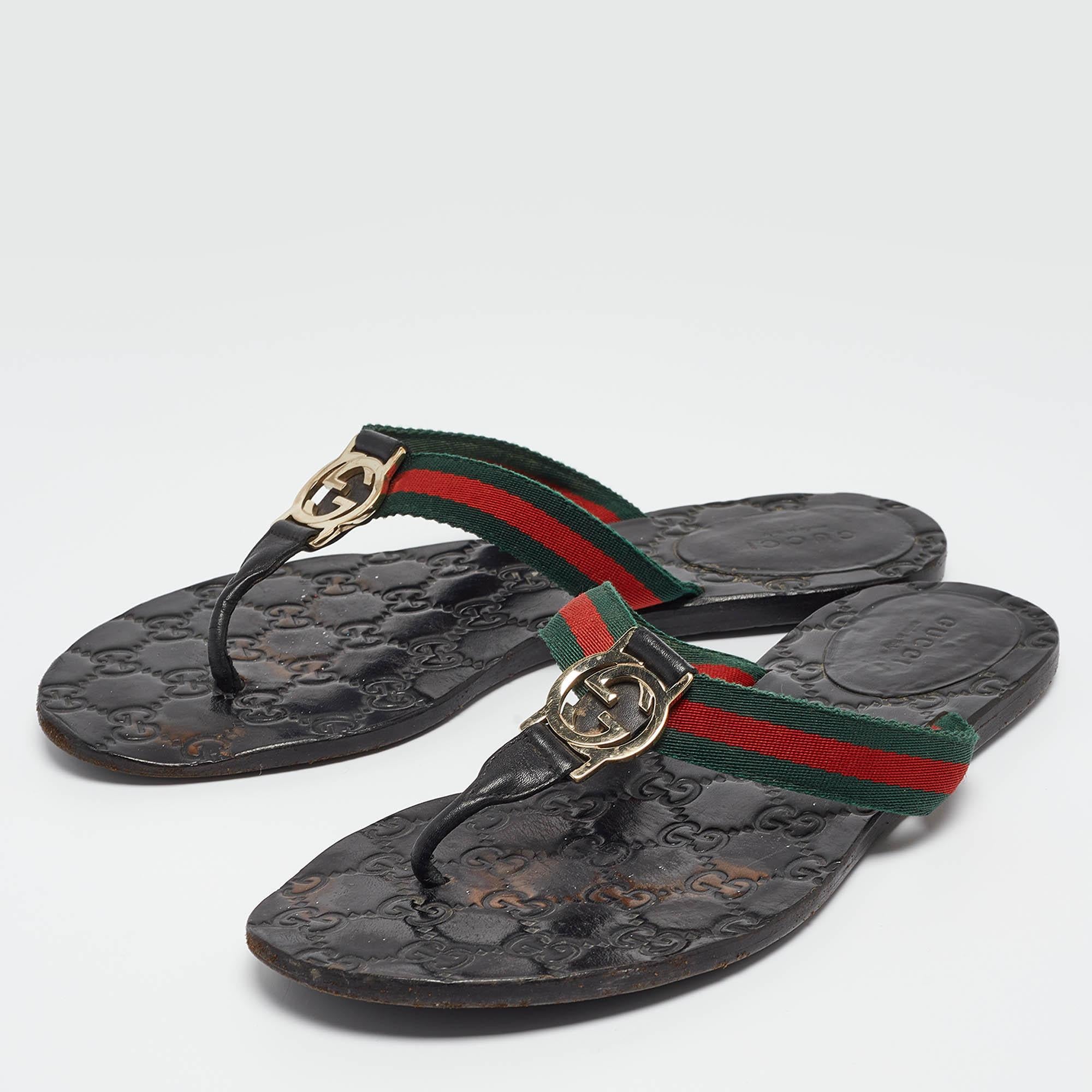 Designed with several House elements together, these Gucci sandals will infuse luxury into your outfit. The insole is detailed with a GG pattern, and they combine red and green Web straps with an interlocking 'G' motif on the front. Made from