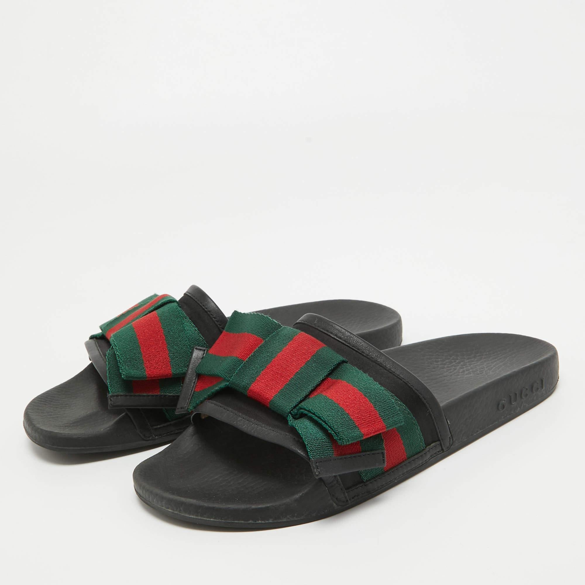 Let this comfortable pair be your first choice when you're home or at the pool. These Gucci slides have well-sewn uppers beautifully set on durable soles.

