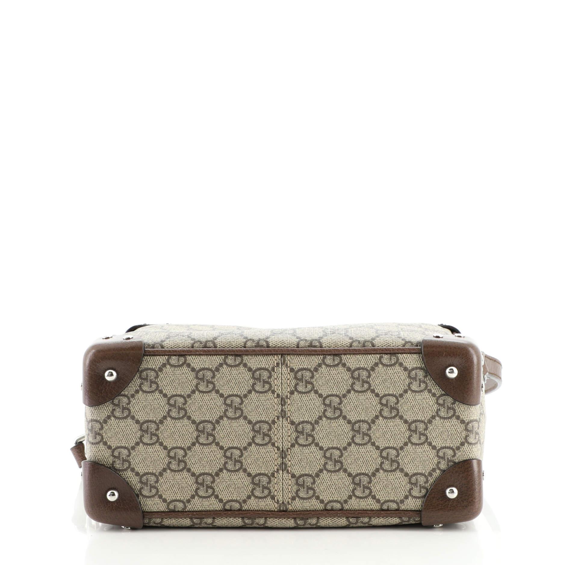 gucci trunk purse