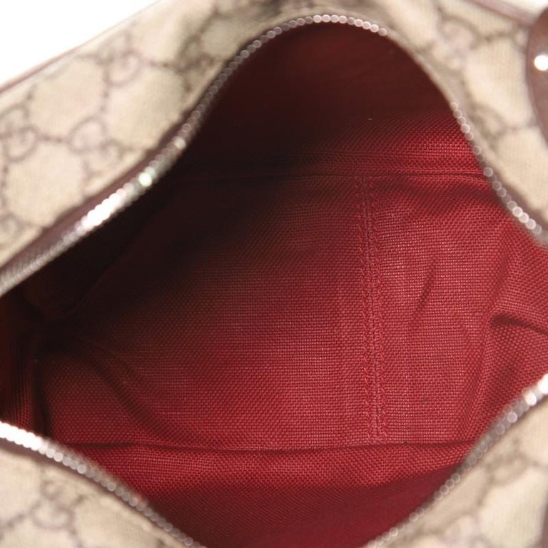 Gucci Trunk Shoulder Bag GG Coated Canvas with Studded Leather at