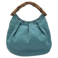 Gucci - Sac hobo clouté en cuir turquoise et bambou