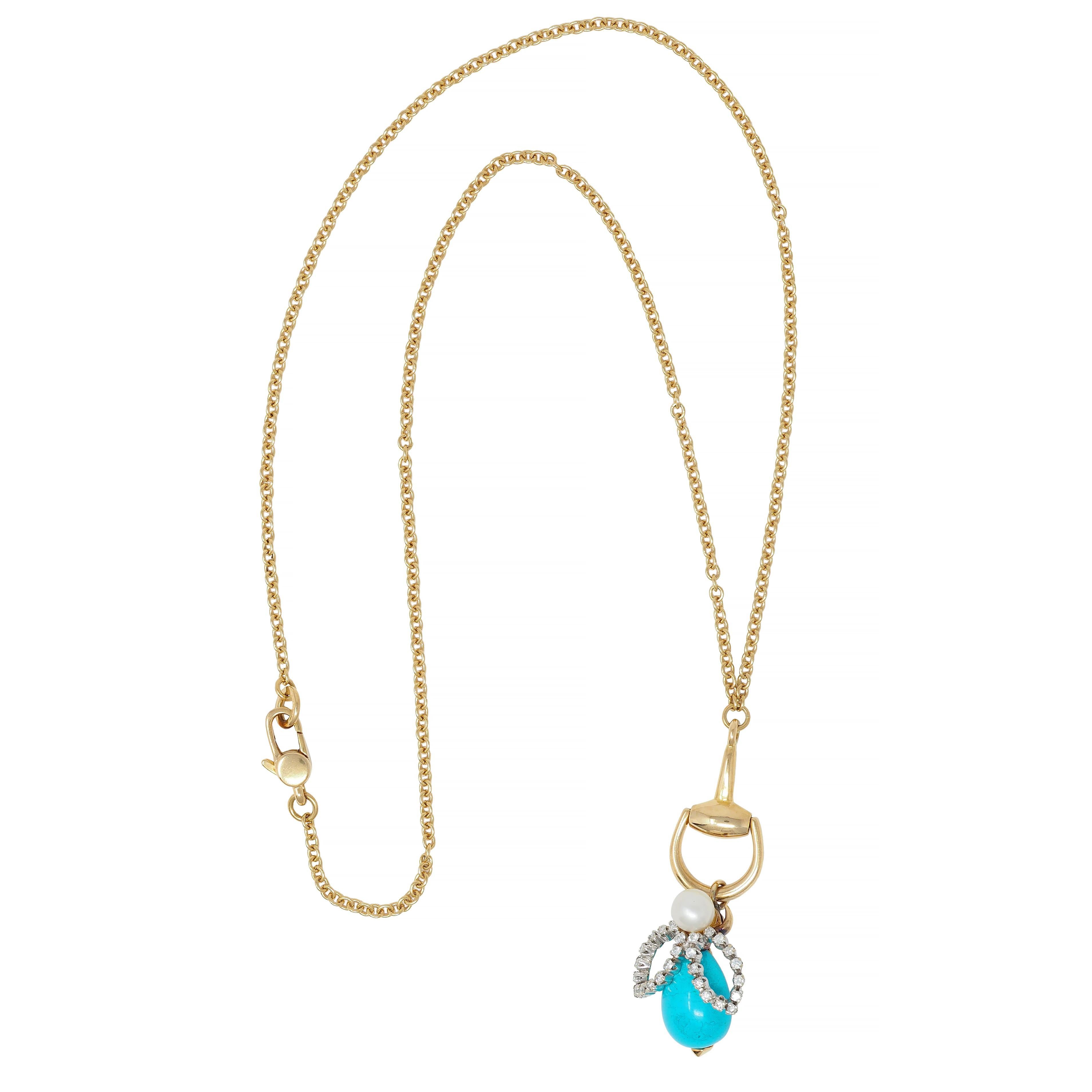 Designed as a 2.0 mm cable link chain centering a gold hinged horsebit motif pendant
Suspending an articulated and stylized bee motif drop with a turquoise body
Opaque robins egg blue and pear shaped - measuring 9.0 x 10.0 mm 
With platinum wings