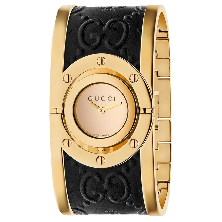 Gucci Twirl Gold Dial Ladies Two-Tone Bangle Watch Item No. YA112444