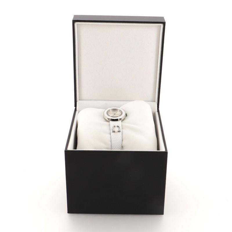This item can only be shipped within the United States.

Condition: Great. Minor glue stains and wear on strap, faint scratches on hardware.
Accessories: Box
Measurements: Case Size/Width: 25mm, Watch Height: 7mm, Band Width: 13mm, Wrist