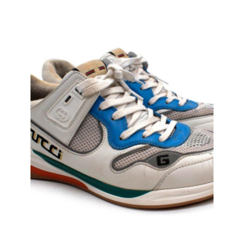 Gucci Ultrapace Distressed Leather And Mesh White Low Top Sneakers

-Lace up fastening 
-Runner sole 
-Mesh panels 
-Green, blue and orange panels 
-Round toe 

Material: 

Leather 
Rubber 

Made in Italy 

9.5/10 excellent conditions, please refer