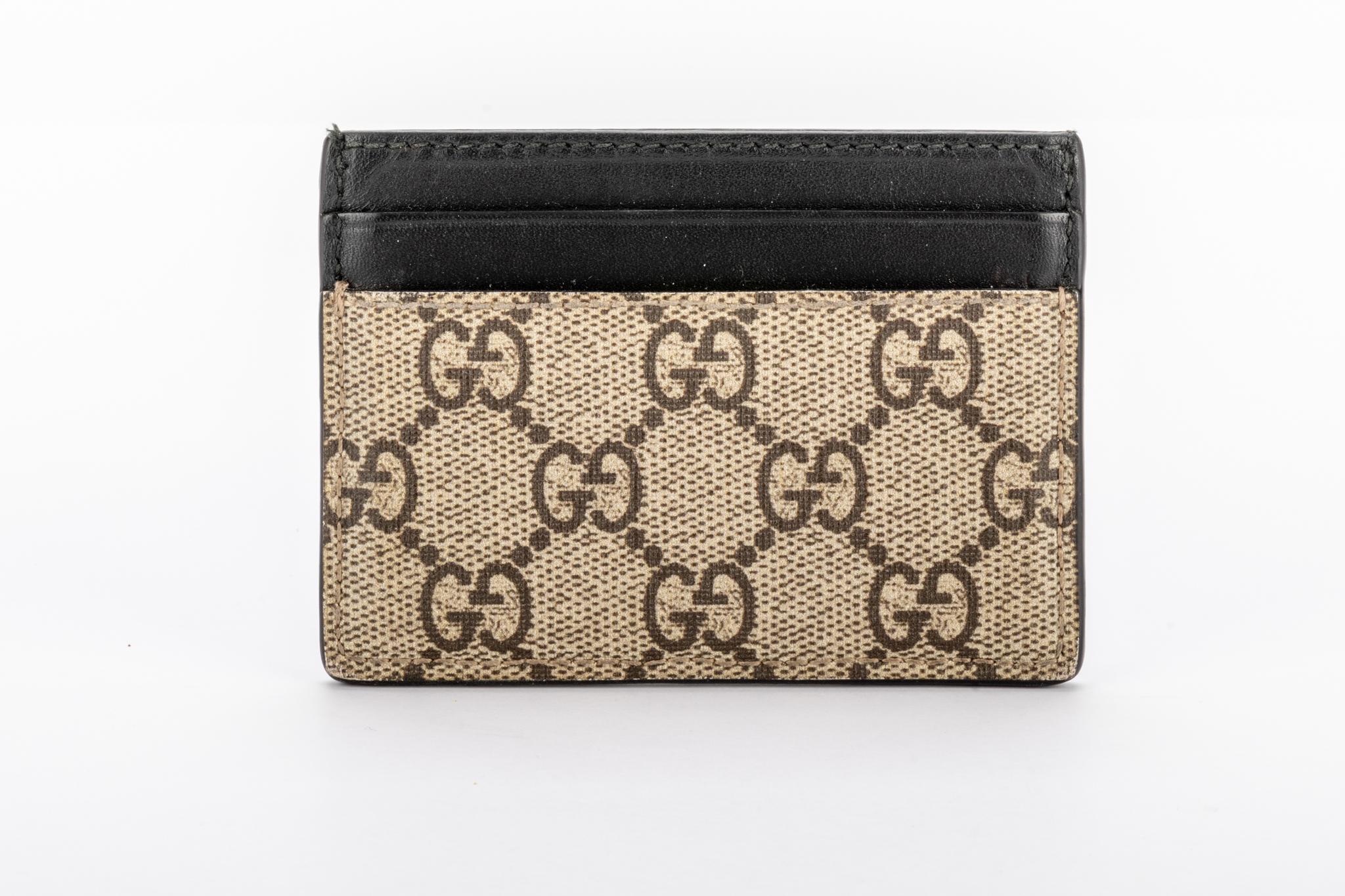 Gucci monogram coated canvas credit card case. Limited edition with red snake design. Comes with Gucci museum shopping bag.
