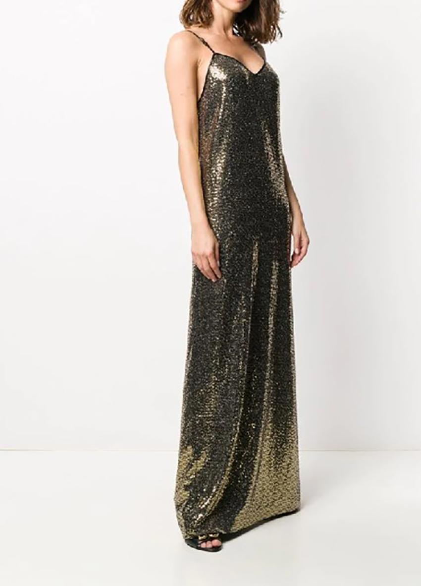 GUCCI 


V-Neck Long Dress

Gucci Slip Dress
Color: Gold
Sequin Embellishments
Sleeveless with V-Neck
Concealed Zip Closure at Back
Designer Fit: Dresses by Gucci typically fit true to size.

Content: 93% Polyamide, 4% Elastane, 3% Metal

Size