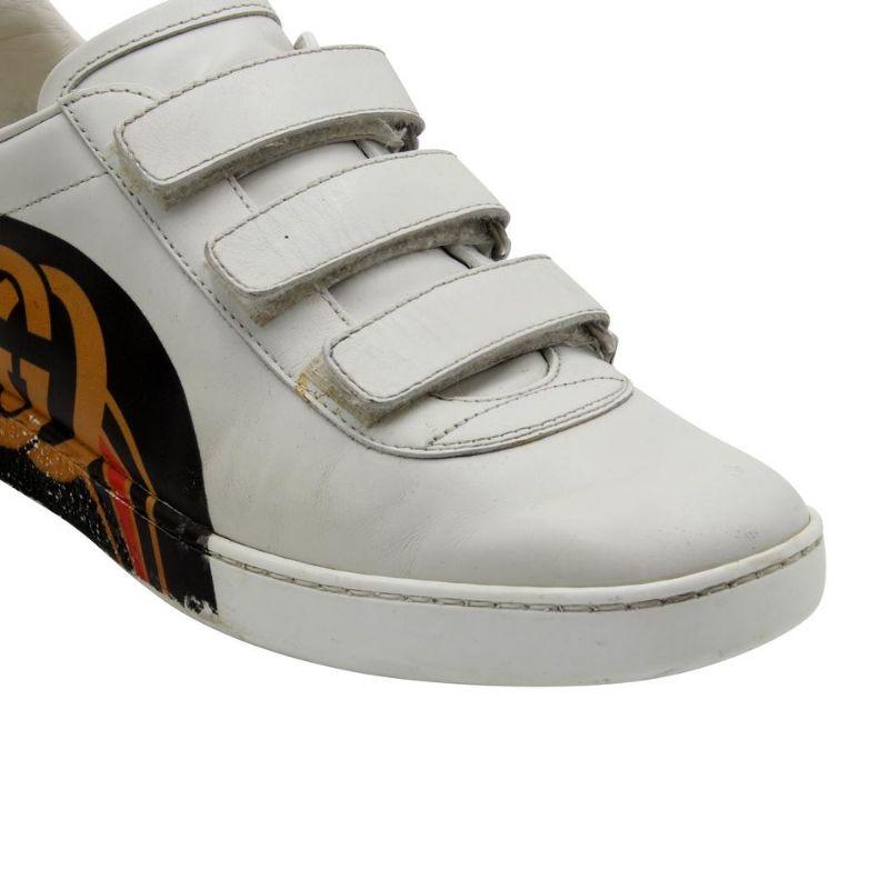 Gucci Velcro New Ace 39 Leather Retro GG Logo Sneakers GG-0203N-0002

These fabulous white sneakers were designed with a retro influence. They feature GG retro logo and Velcro straps. The backs of the heels are finished with green and red leather.