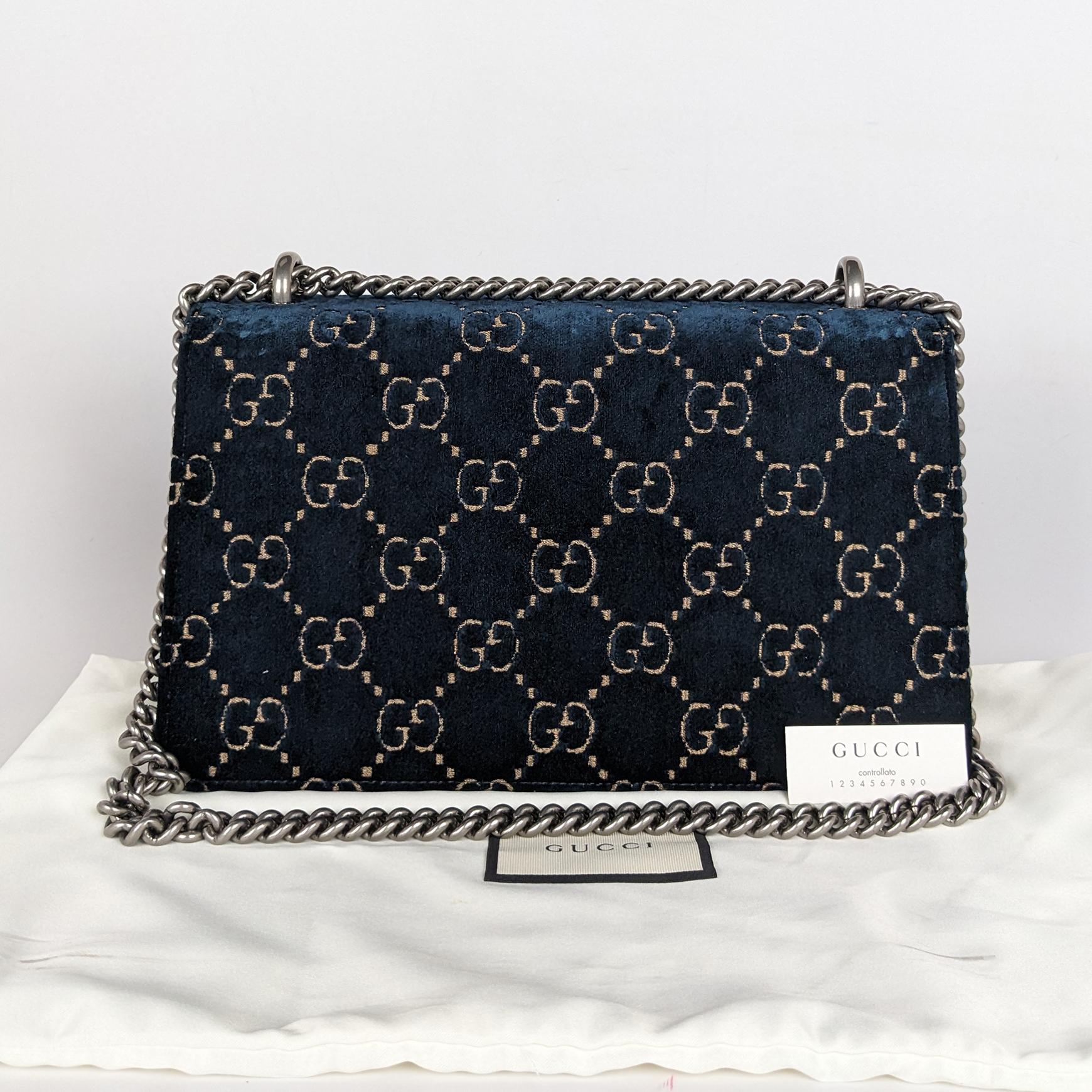 Condition: This authentic Gucci bag is in excellent pre-loved condition. There is a small mark in the interior and minor denting on velvet near strap bases.

Est. Retail: $2650

Includes: Dust bag, control card

Features: Aged silver chain looping