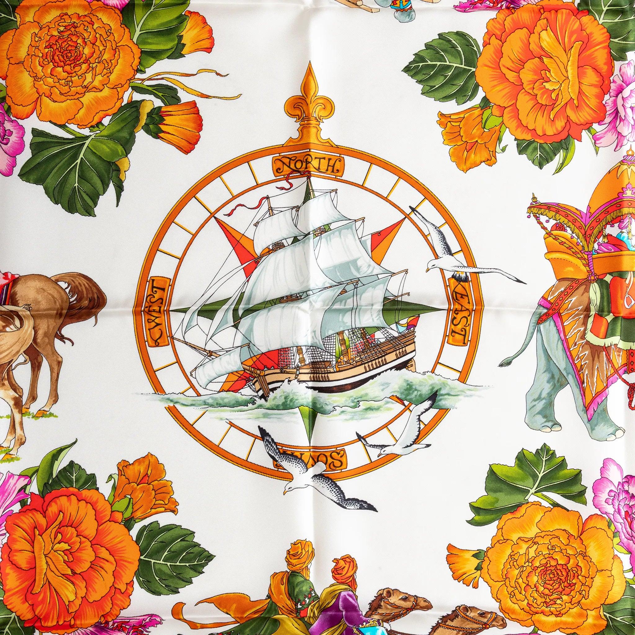 Gucci “Viaggi” silk scarf featuring vibrant florals, camels, and a nautical compass on white silk twill. A rare collector’s travel-inspired carré. 
 Material: 100% Silk 
 Measurements: Length:87;Width:87