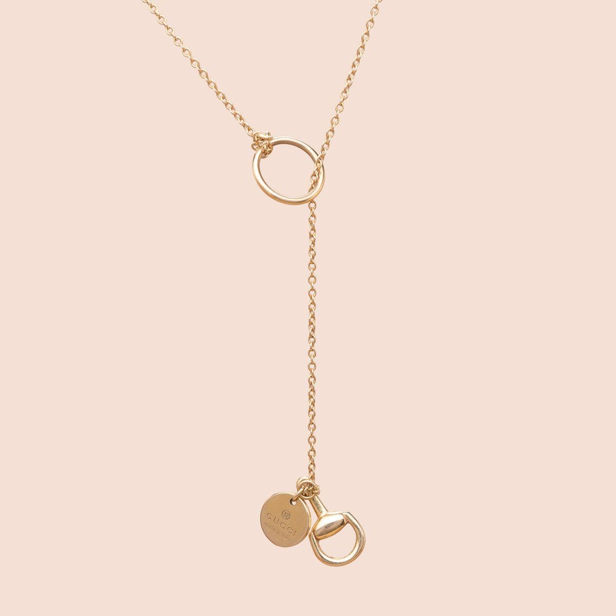Gucci. Vintage 1990s. Sliding 18K gold necklace featuring a horse bridle bit knot. 
Signed along with the copyright symbol 
Italian made
Lenght : around 50cm 
Gross weight : 3.96g

______________________-

Gucci. Années 1990. Collier cravate ou