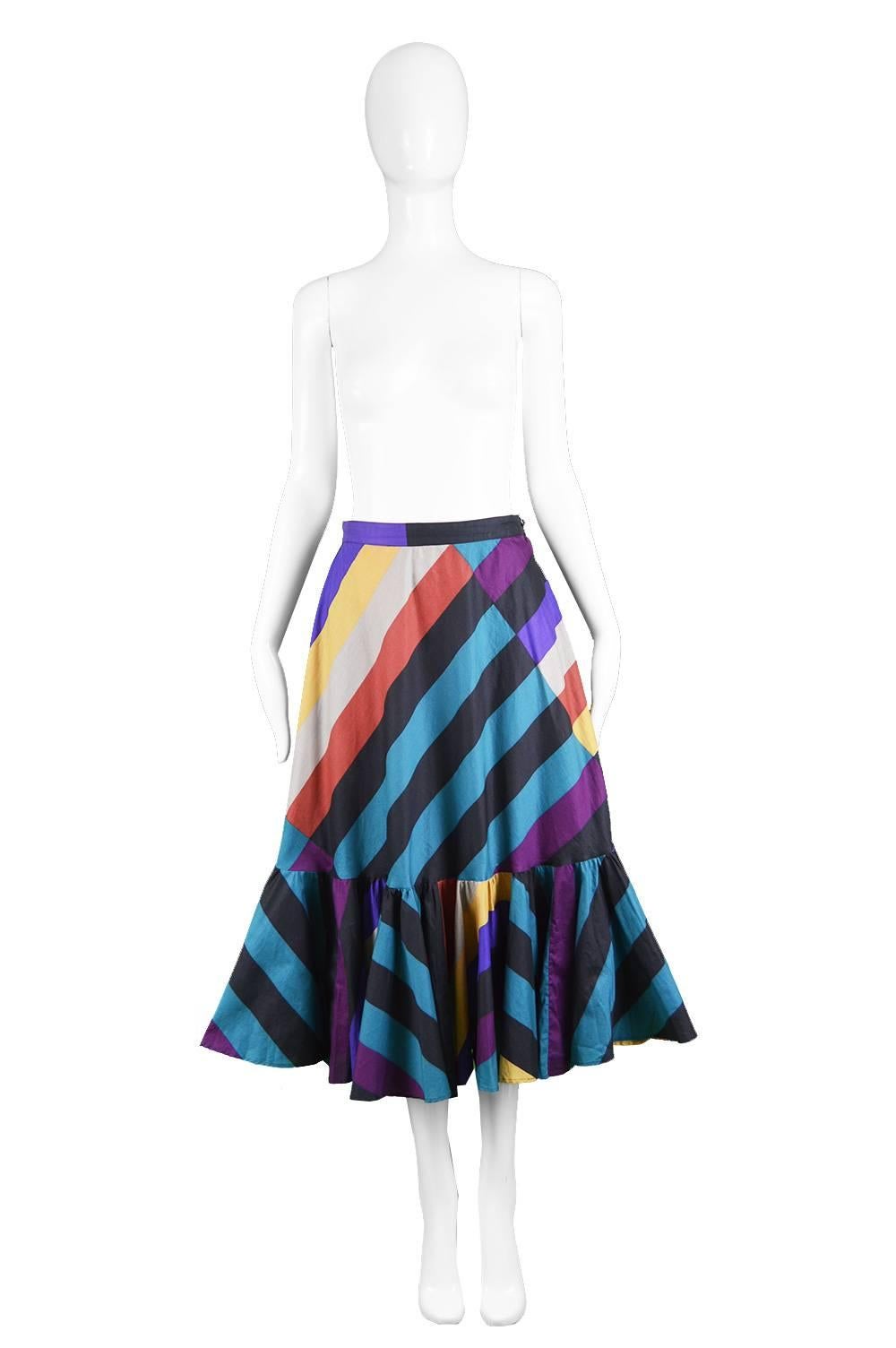 G. Gucci Vintage 1970's Colorful Stripy Cotton Skirt with Full Flounce Hem

Estimated Size: UK 10/ US 6/ EU 38. Please check measurements.
Waist - 28” / 71cm
Hips - Free
Length (Waist to Hem) - 31” / 79cm

Condition: Excellent Vintage Condition - A