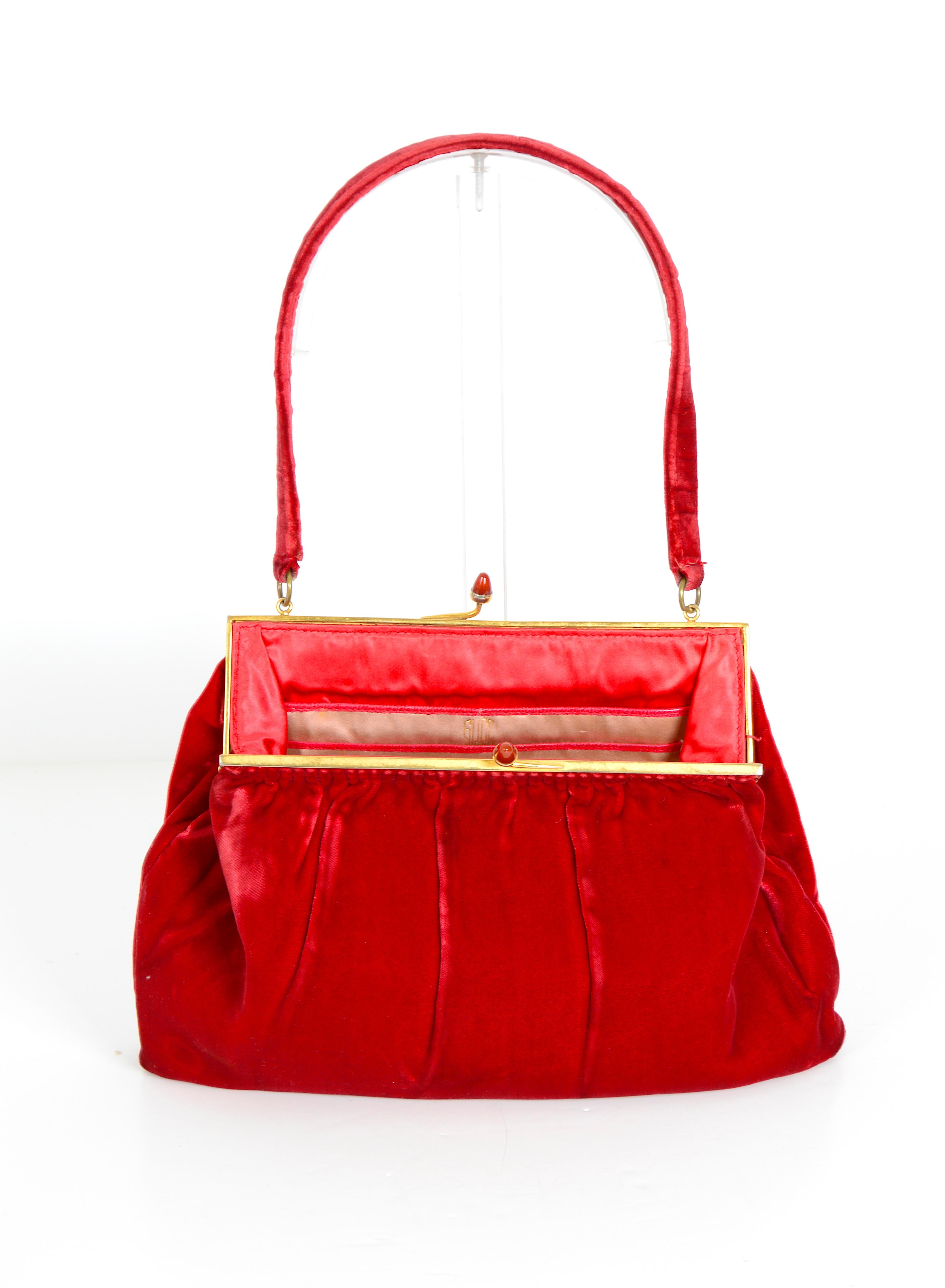 Red Gucci vintage 1970s silk velvet top handle bag with a stone jewel closure