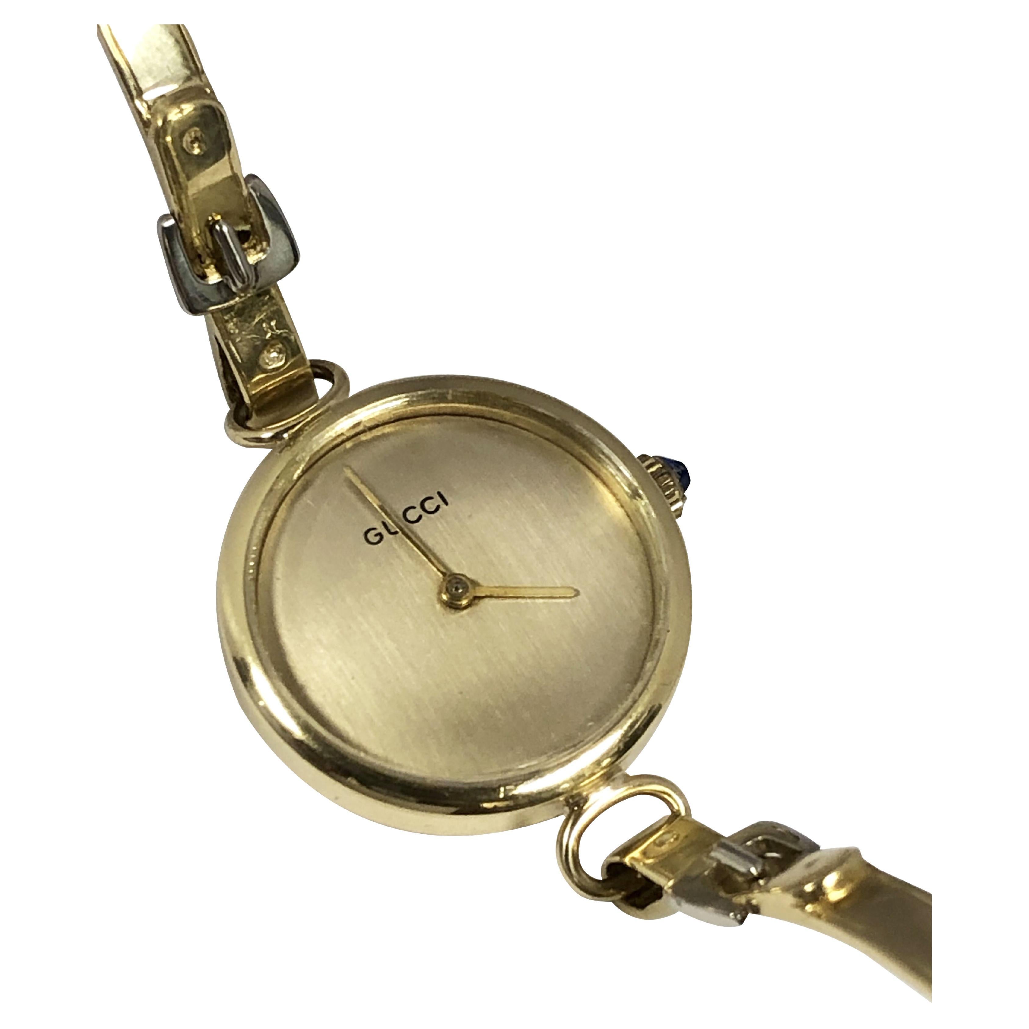 Gucci, montre-bracelet vintage en or jaune pour femmes des années 1970 en vente