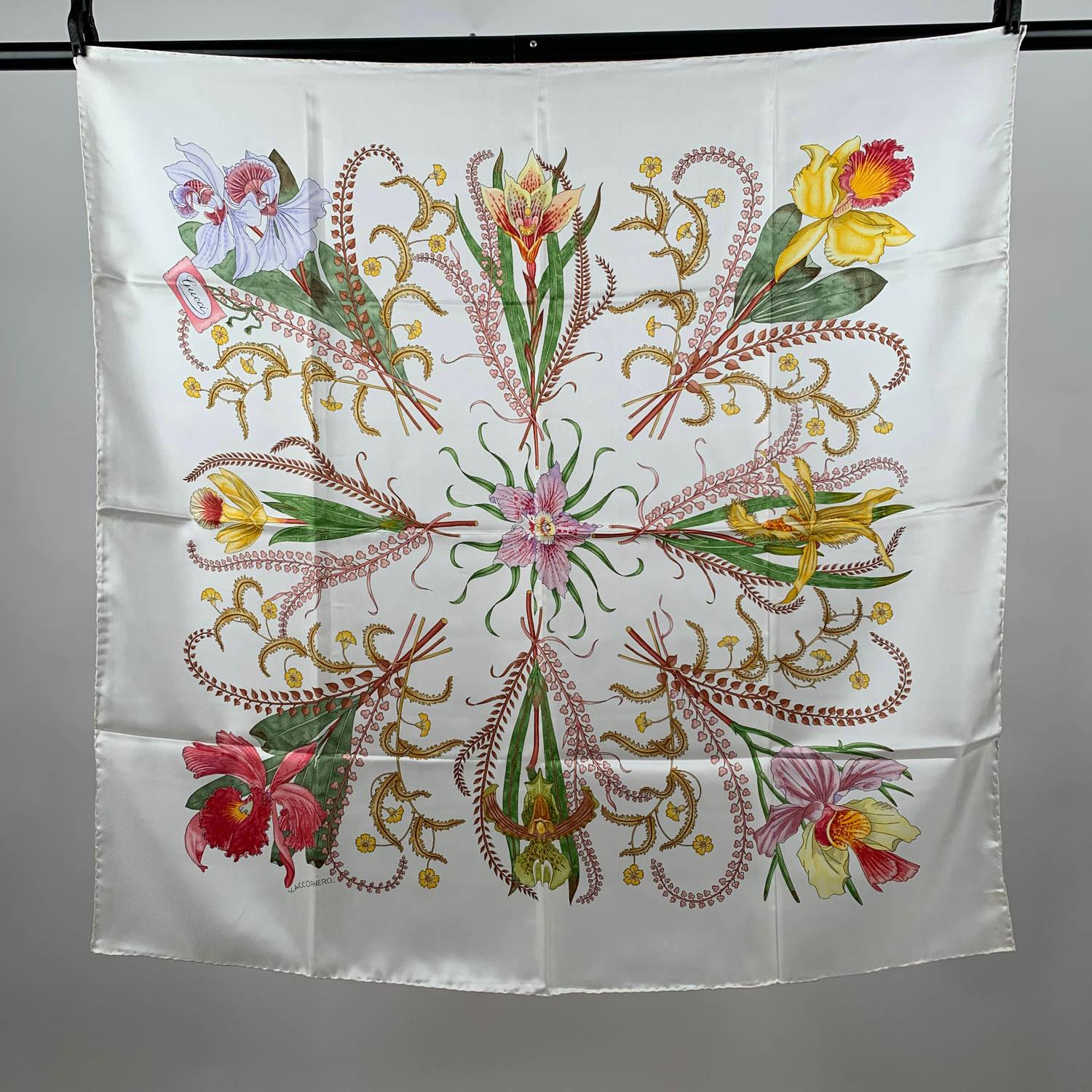 Gucci Vintage 1974 White Silk Scarf Accornero Orchidee Orchids

- Title: 'Orchidee' (Orchids) - Designed by Vittorio Accornero for GUCCI in the 1974 - Beautiful and colorful lap  of orchids and ferns of various species, with central flower on a