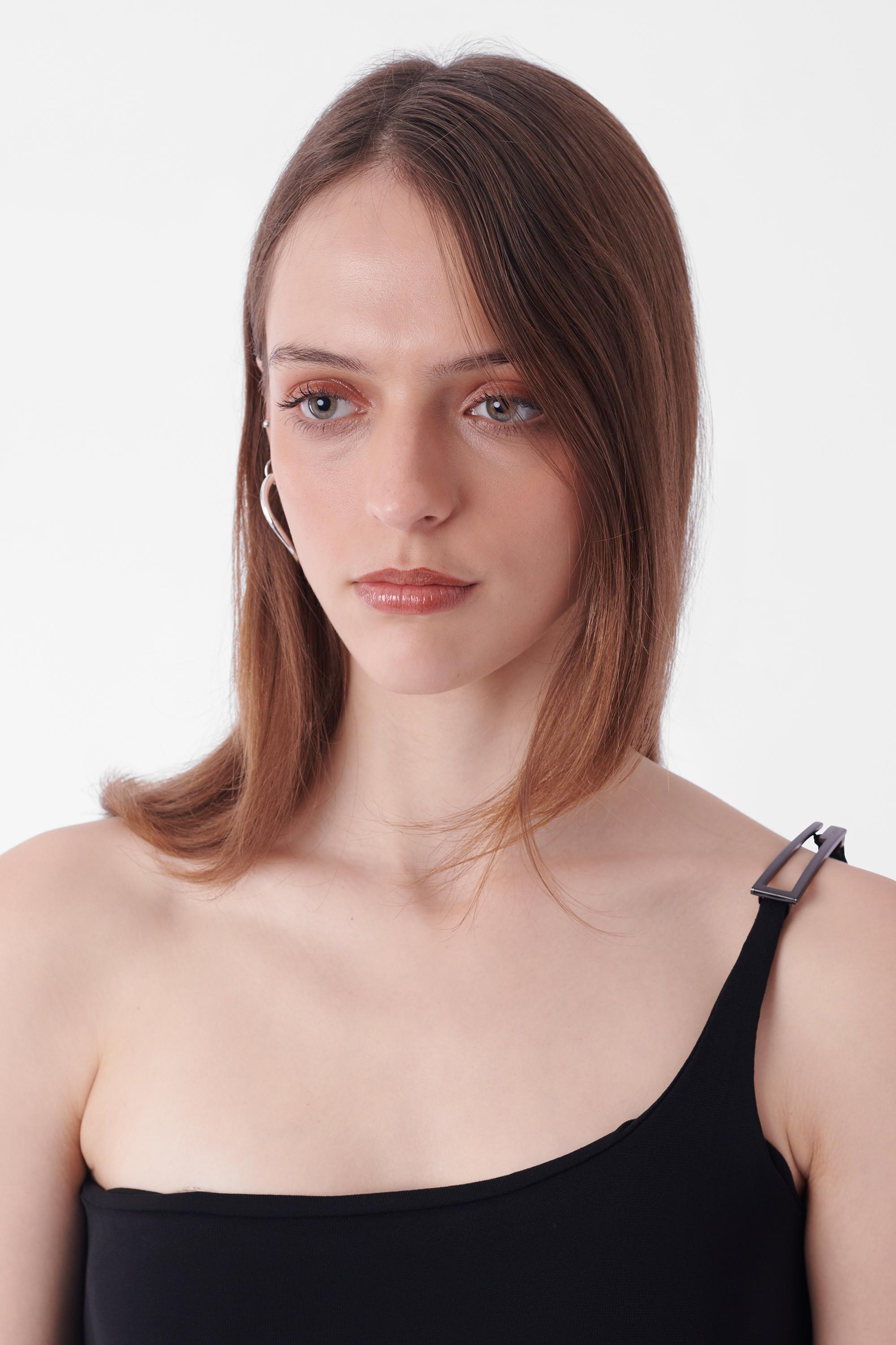 Tom Ford for Gucci single strap hardware dress. Features one-shoulder silhouette, Gucci metal hardware and maxi length. In great vintage condition, a few minor removable marks to the fabric.
Brand: Gucci
Size: UK 10
Color: Black
Label size: