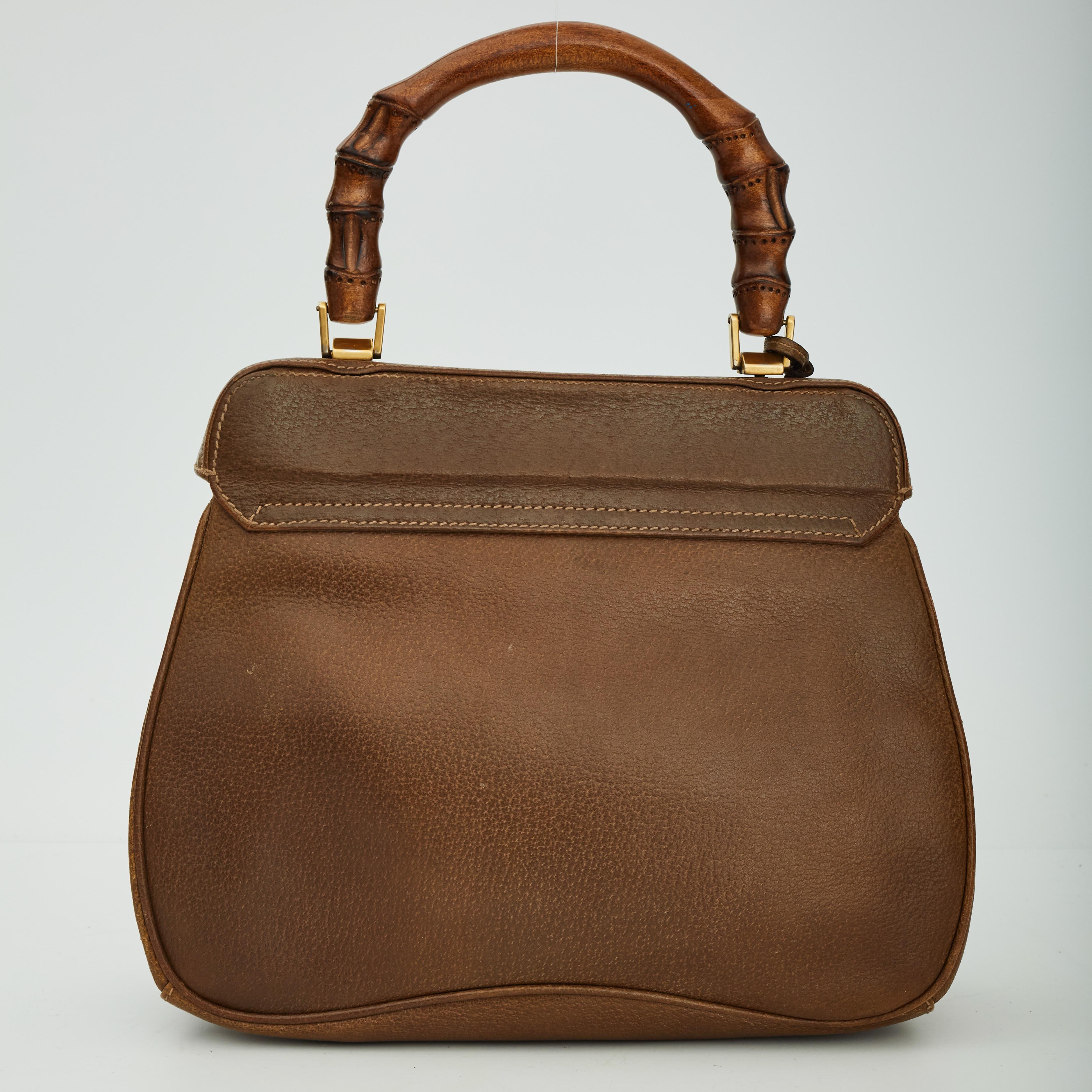 COLOR: Brown
MATERIAL: Textured leather
ITEM CODE: 000, 406, 0190 
MEASURES: H 8.5” x L 11” x D 4.5”
DROP: 4.5”
CONDITION: Good - bag was professionally furbished and dyed. Interior small stains, marks and discoloration.

Made in Italy