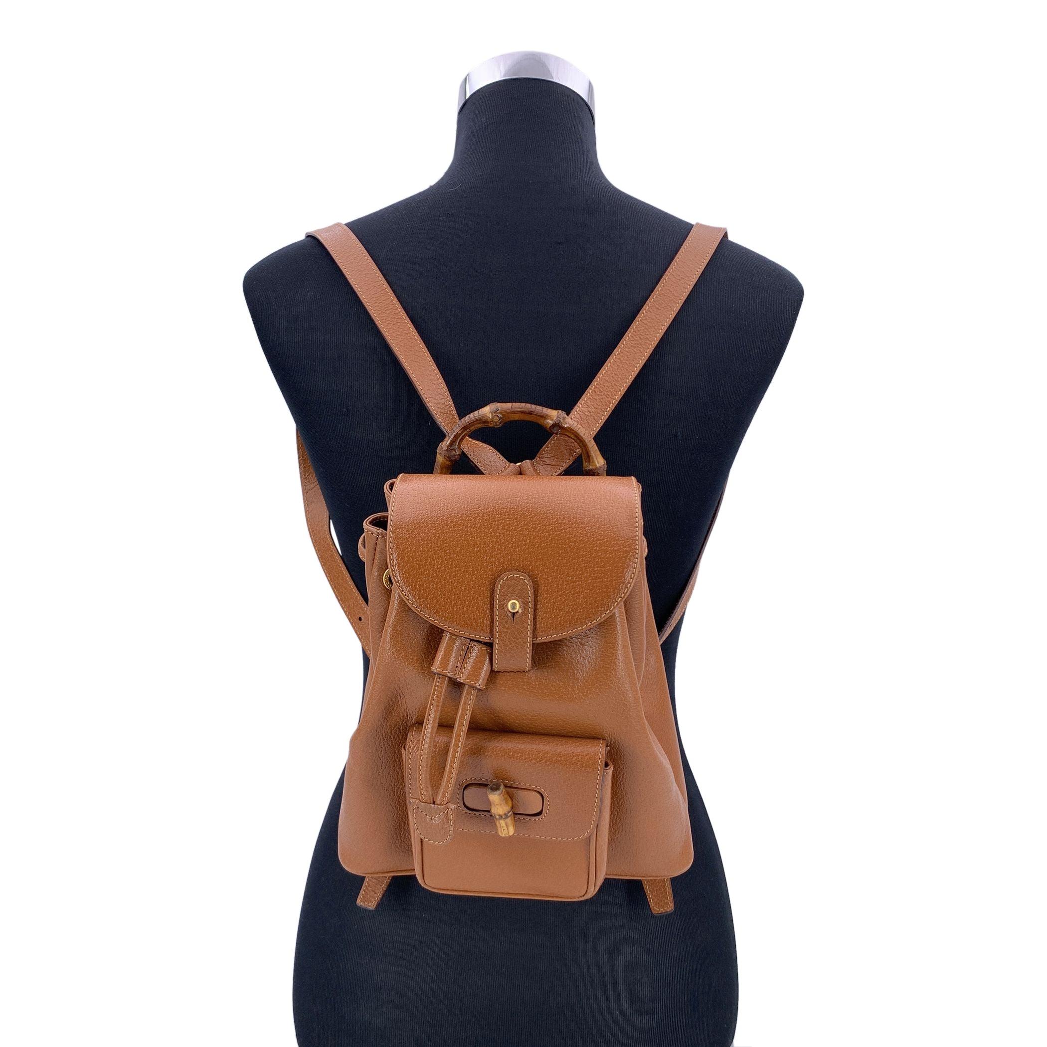 Step into the elegance of vintage luxury with this stunning small backpack by Gucci, a perfect blend of timeless design and functionality. Crafted in beige leather, the bag is both chic and versatile, making it an ideal companion for day-to-day