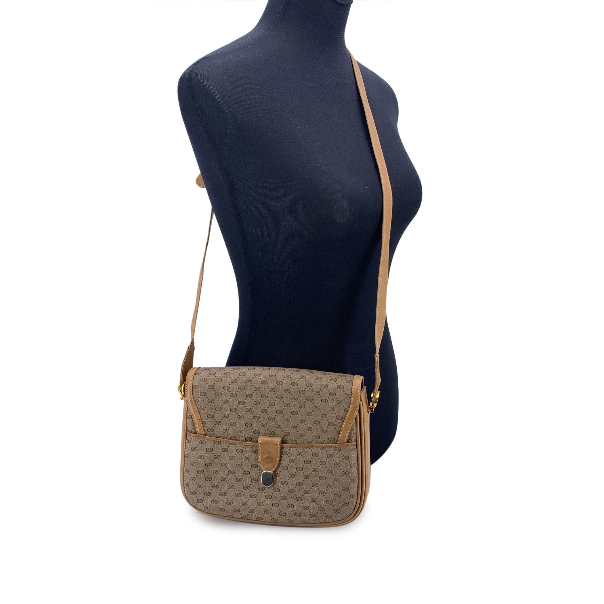 A true relic of understated luxury, this Gucci Vintage Flap Shoulder Bag in classic beige monogram canvas is a love letter to the house's heritage. Crafted in beige GG monogram canvas and finished with beige genuine leather trim, it's a nod to