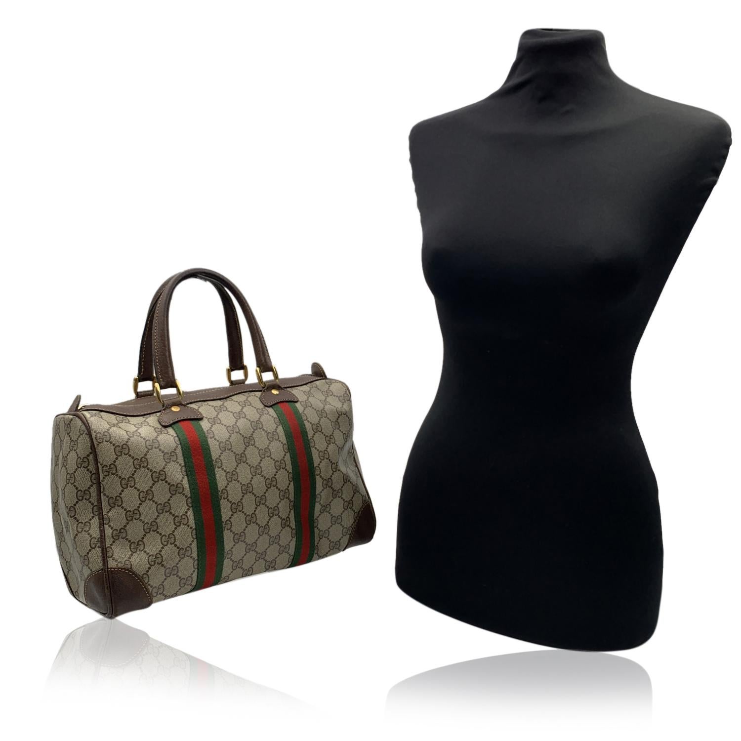 Vintage Gucci Monogram Boston Bag. Beige monogram canvas with Green/Red/Green stripes detailing. Genuine leather trim and handles.Double top handles. Upper zipper closure. 'Made in Italy by GUCCI' tag inside.

Details

MATERIAL: Canvas

COLOR: