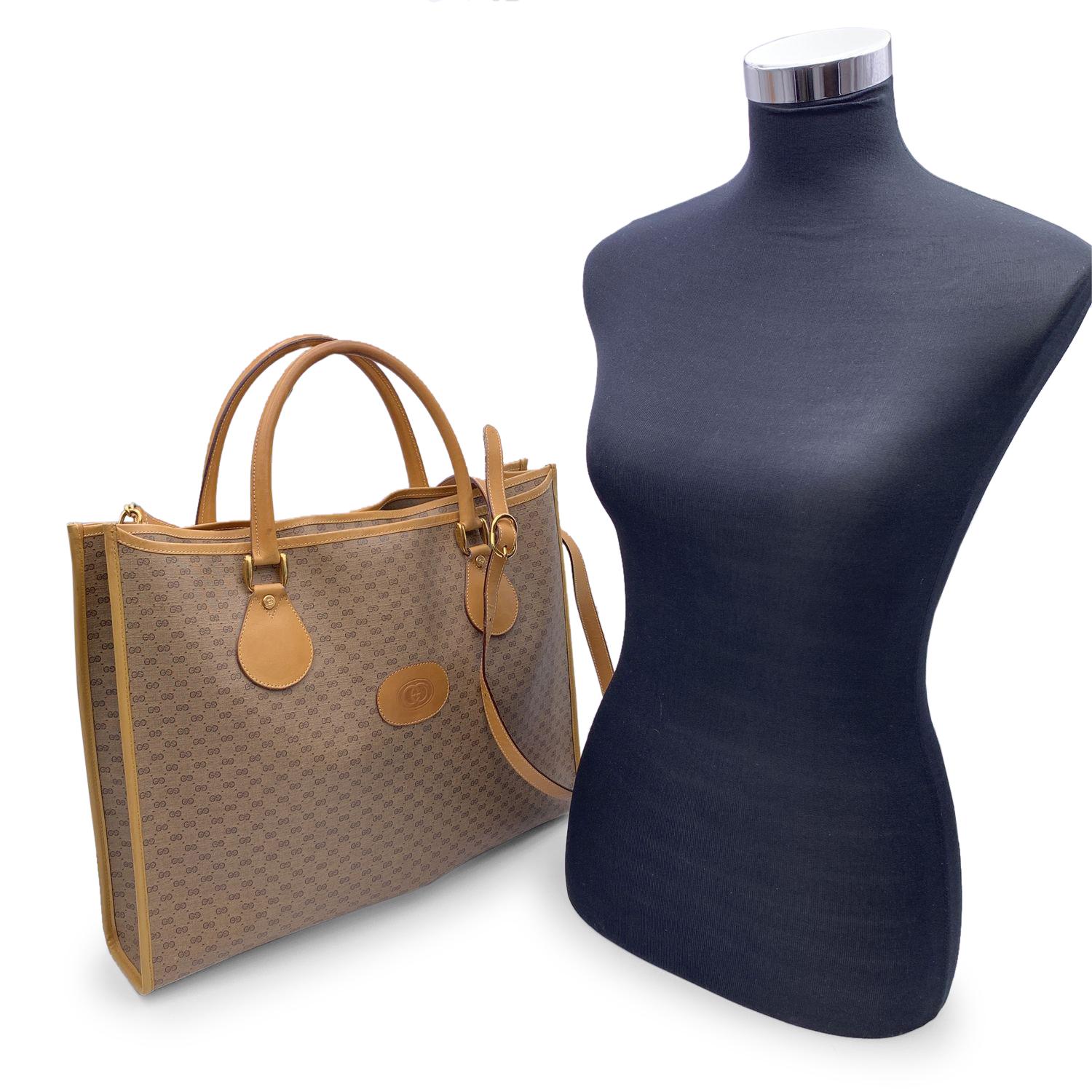 Beautiful Gucci tote made in beige monogram canvas with beige leather trim and front pocket. 1 front and rear pocket. Button closure on top. Brown canvas lining. 'GUCCI - Italy' embossed inside (with serial number on its reverse)

Condition

A -