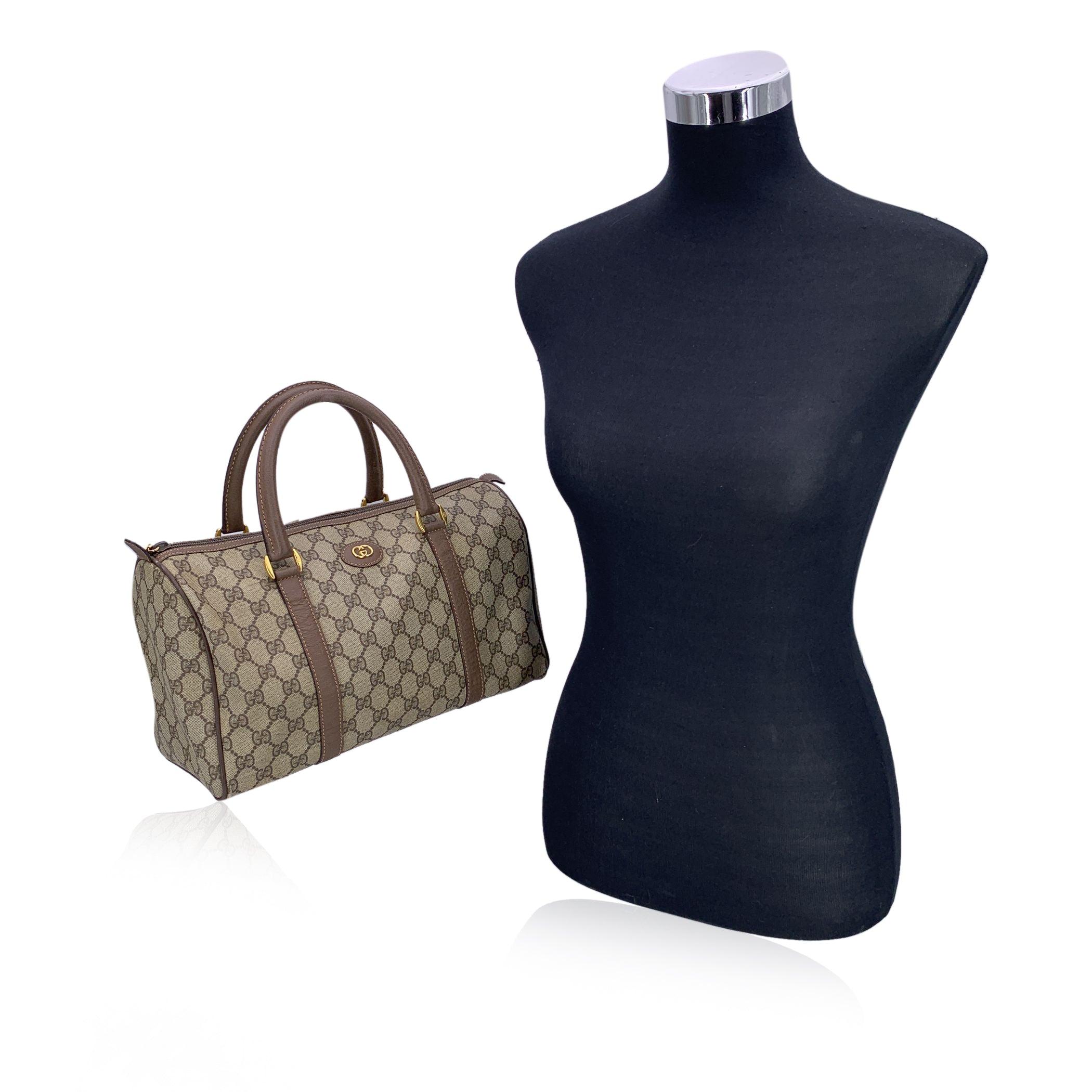 There's something irresistibly timeless about the Gucci Boston Bag, and this vintage beauty is no exception. A true classic from Gucci's golden era, this Vintage Beige Canvas and Leather Monogram Boston Bag carries the quiet luxury and unmistakable