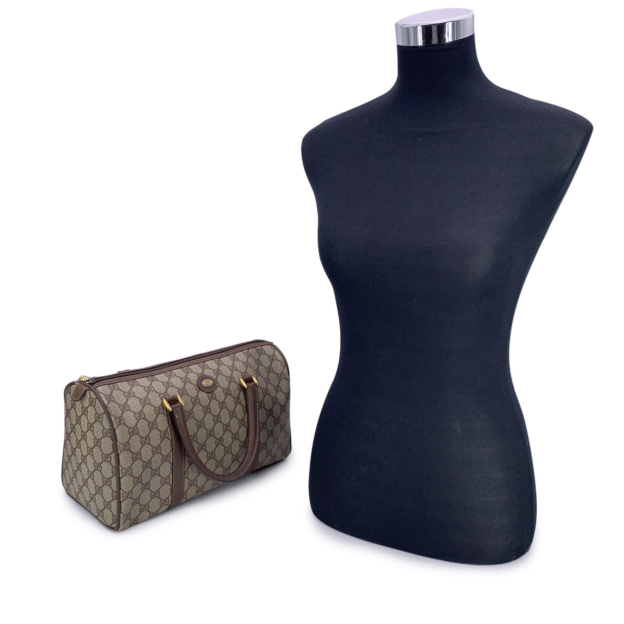 There's something irresistibly timeless about the Gucci Boston Bag, and this vintage beauty is no exception. A true classic from Gucci's golden era, this Vintage Beige Canvas and Leather Monogram Boston Bag carries the quiet luxury and unmistakable