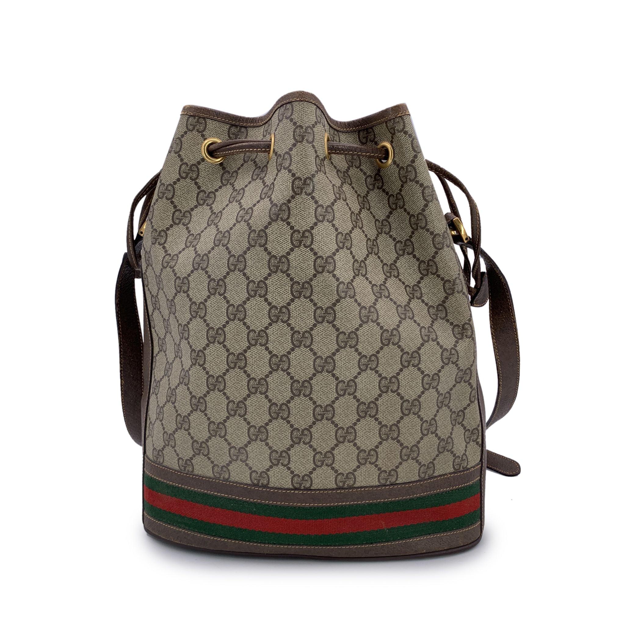 Gucci Vintage Beige Monogram Web Drawstring Bucket Bag In Good Condition In Rome, Rome