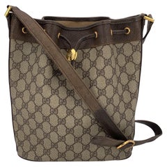 Gucci Vintage Beige Monogram Web Drawstring Bucket Bag Gucci Retro Beige Monogram Web Drawstring Bucket Bag