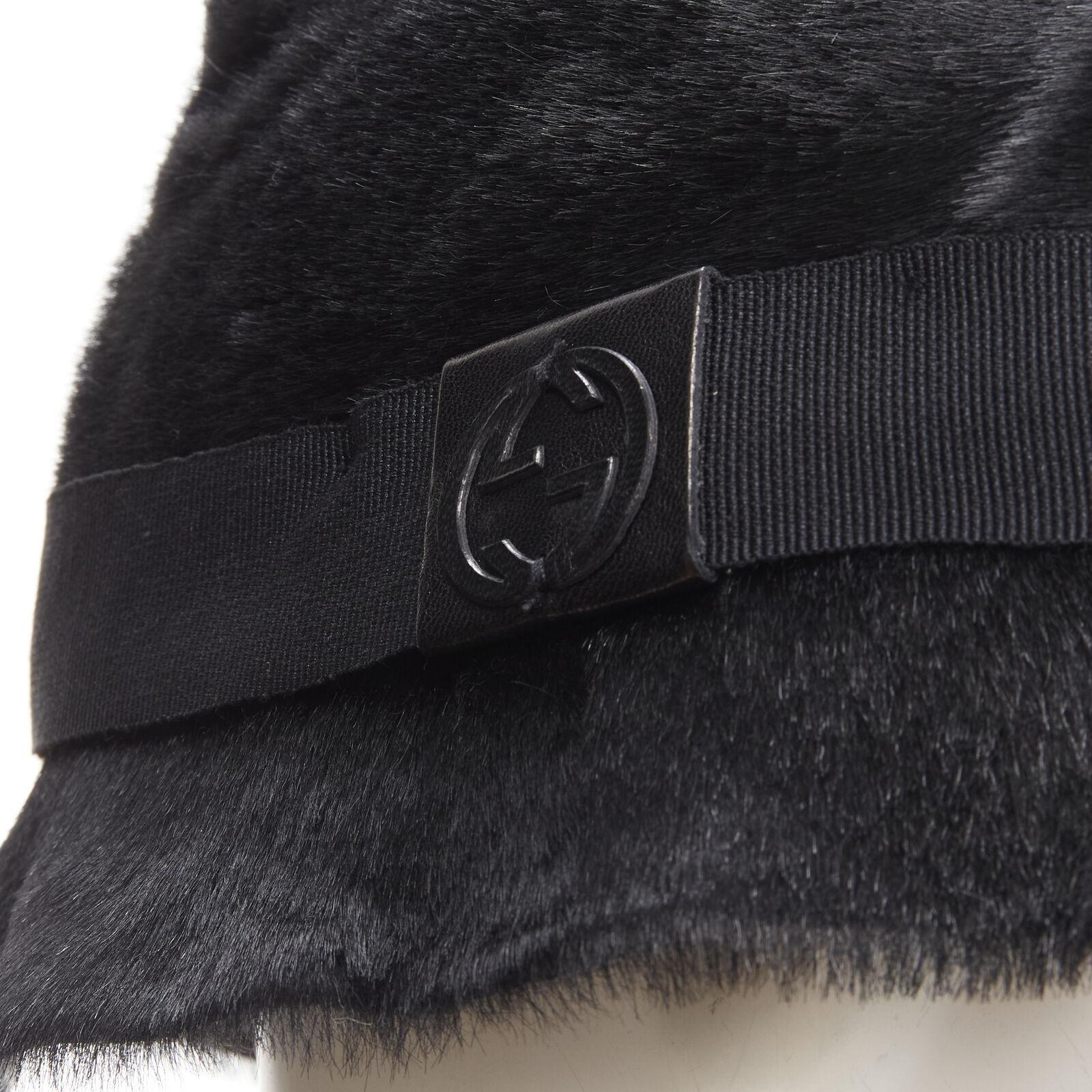 GUCCI Vintage black calf hair leather GG logo grosgrain ribbon bucket hat M
Reference: ANWU/A00870
Brand: Gucci
Designer: Tom Ford
Material: Leather
Color: Black
Pattern: Solid
Lining: Fabric
Extra Details: Genuine fur upper. Black grosgrain ribbon