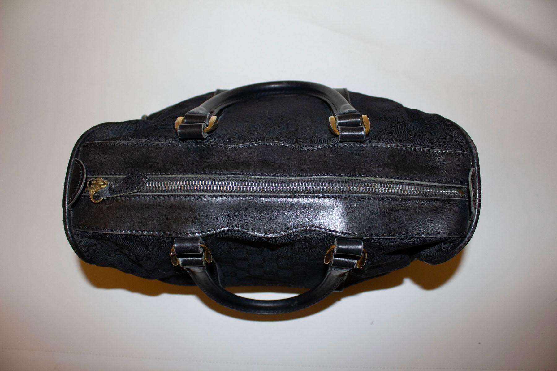 Women's or Men's Gucci  Vintage Black Fabric Barrell Bag For Sale