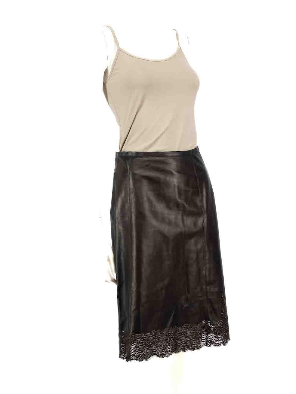 CONDITION is Very good. Hardly any visible wear to skirt is evident on this used Gucci designer resale item.
 
 
 
 Details
 
 
 Vintage
 
 Black
 
 Leather
 
 A-line skirt
 
 Knee length
 
 Perforated hem detail
 
 Side zip and snap button