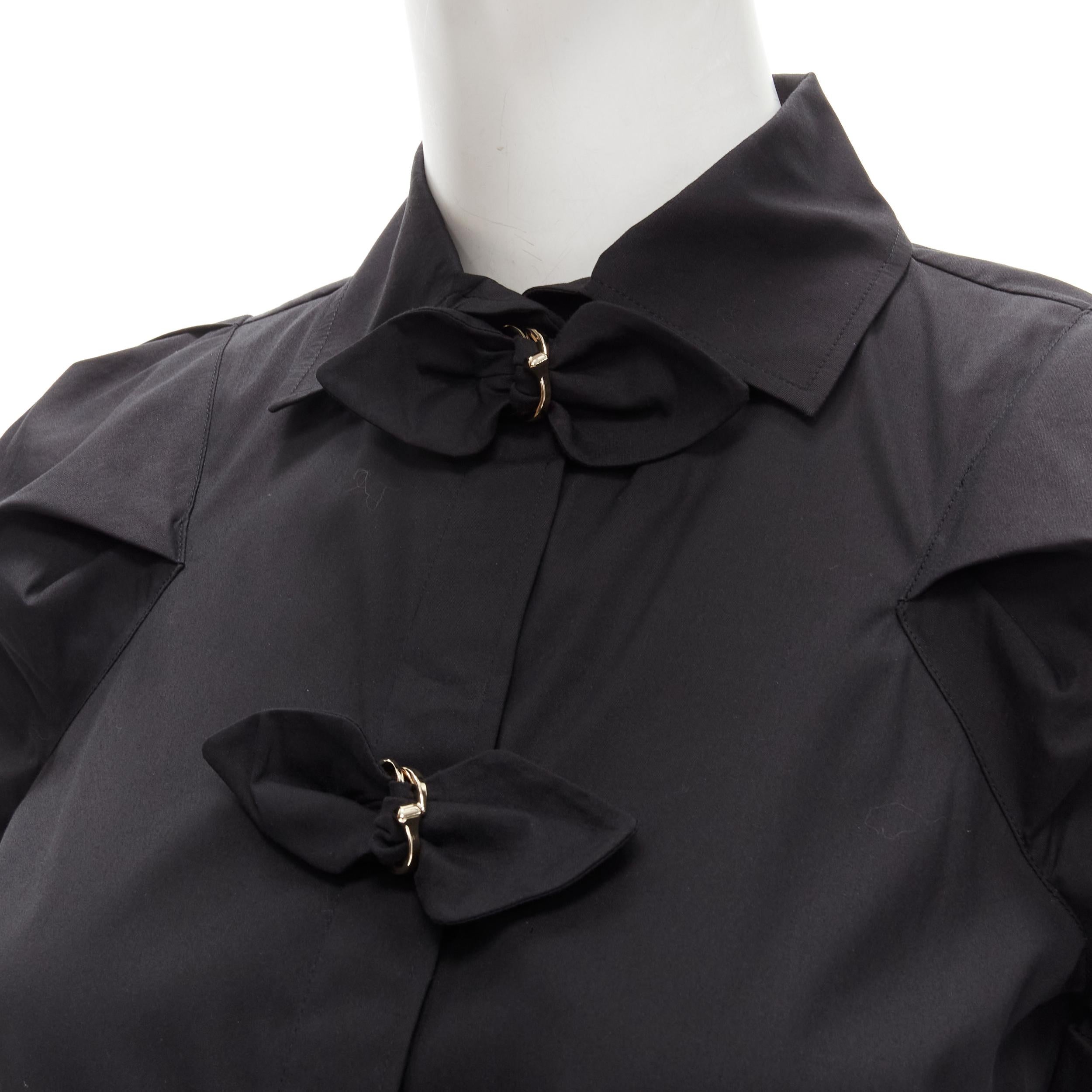 GUCCI Vintage black ribbon loop buckle puff sleeve shirt IT38 XS 
Reference: ANWU/A00647 
Brand: Gucci 
Designer: Tom Ford 
Material: Feels like cotton 
Color: Black 
Pattern: Solid 
Closure: Loop buckle 
Extra Detail: Spread collar with bow ribbon